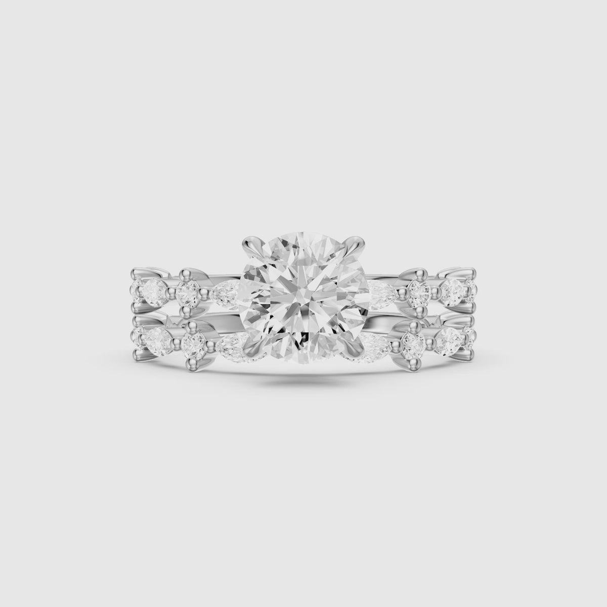Load video: Elen Round Lab Grown Diamond Bridal Set with Round and Marquise Diamond Band