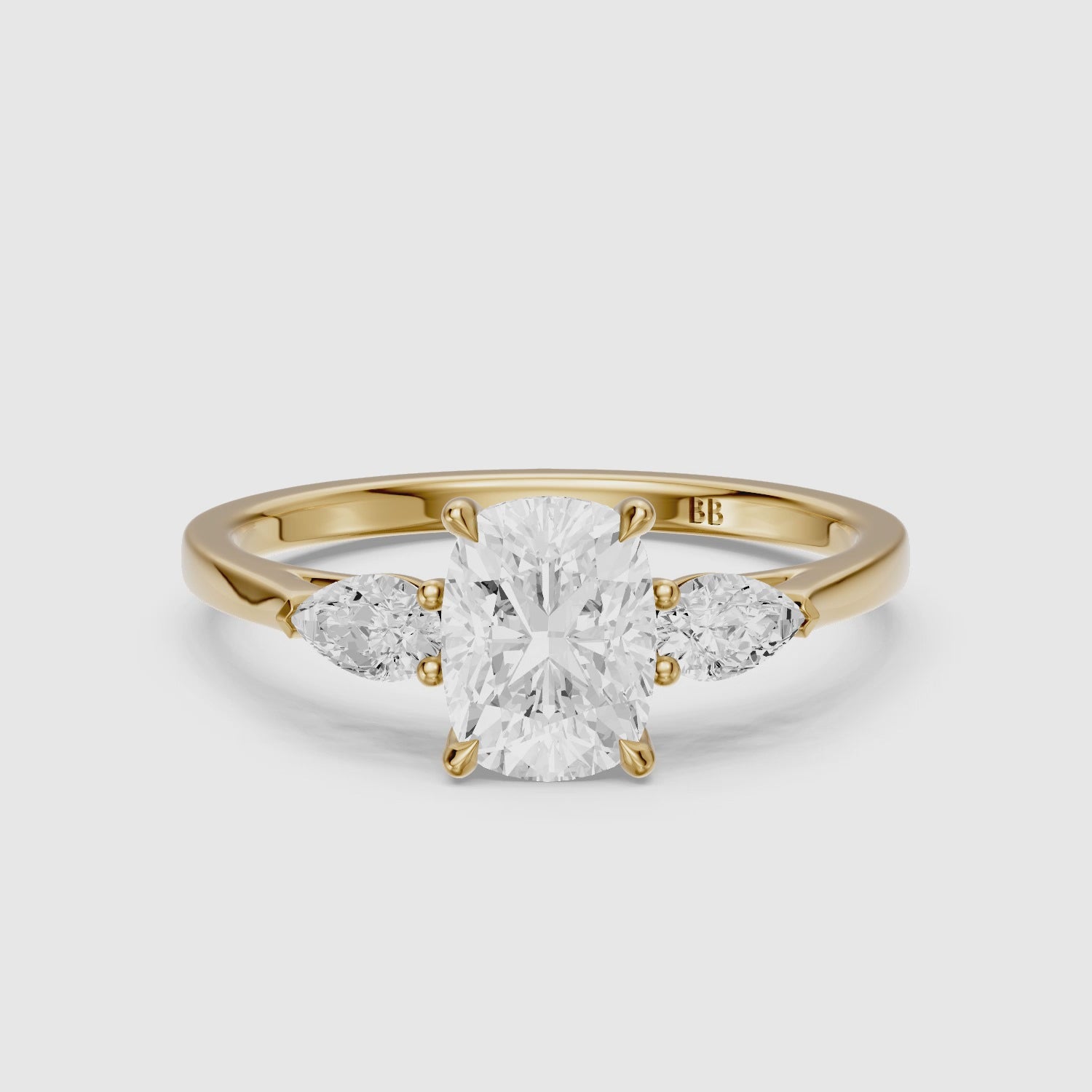 Load video: Nalani Three Stone Elongated Cushion Cut Lab Grown Diamond Ring with Pear Side Stones