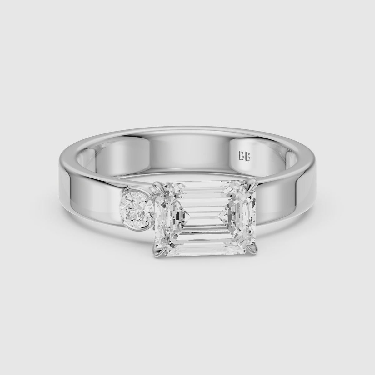 Load video: Rumi Emerald Cut Round Side Stone Moissanite Diamond Engagement Ring