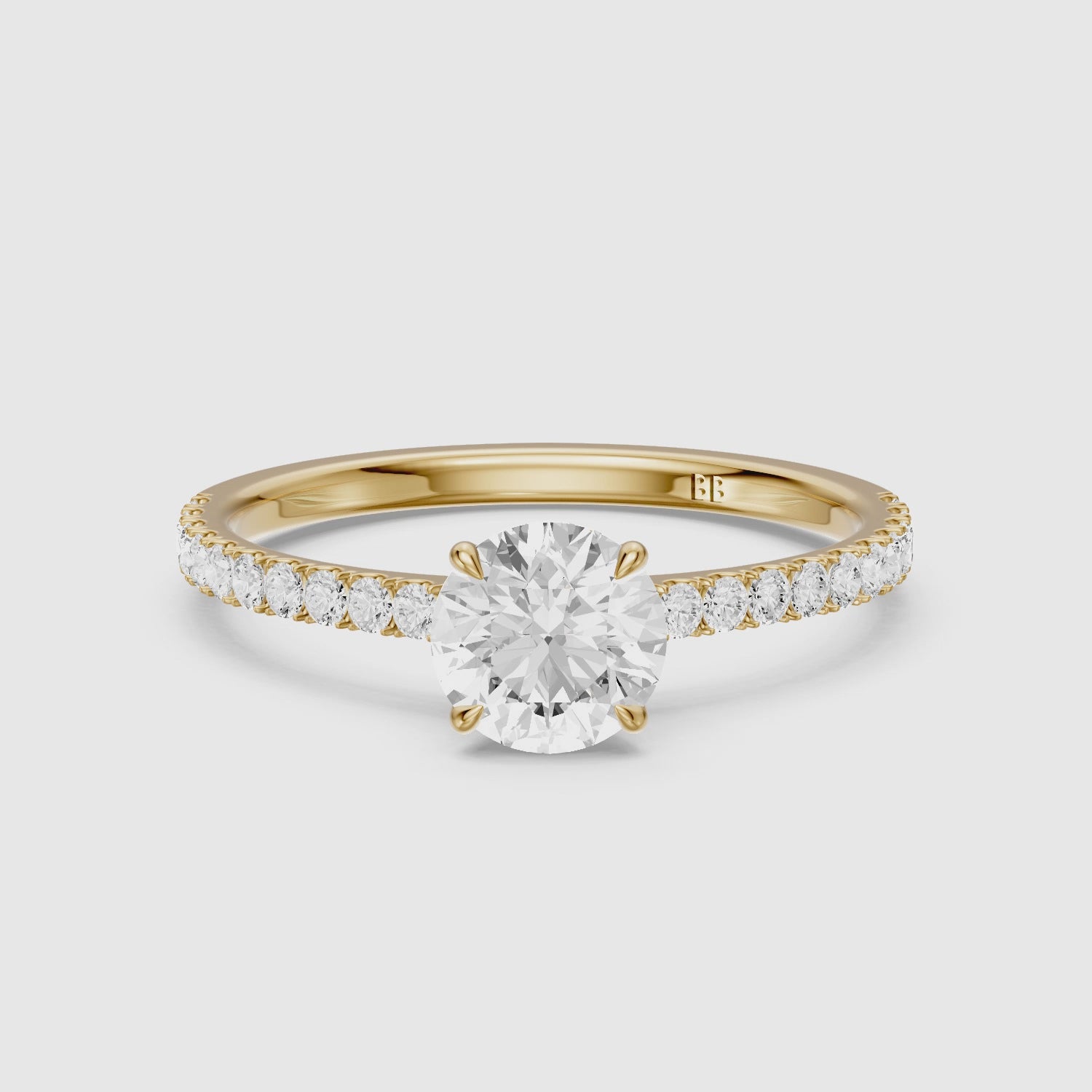Load video: Tinsly Round Cut Side Stone Pave Moissanite Engagement Ring