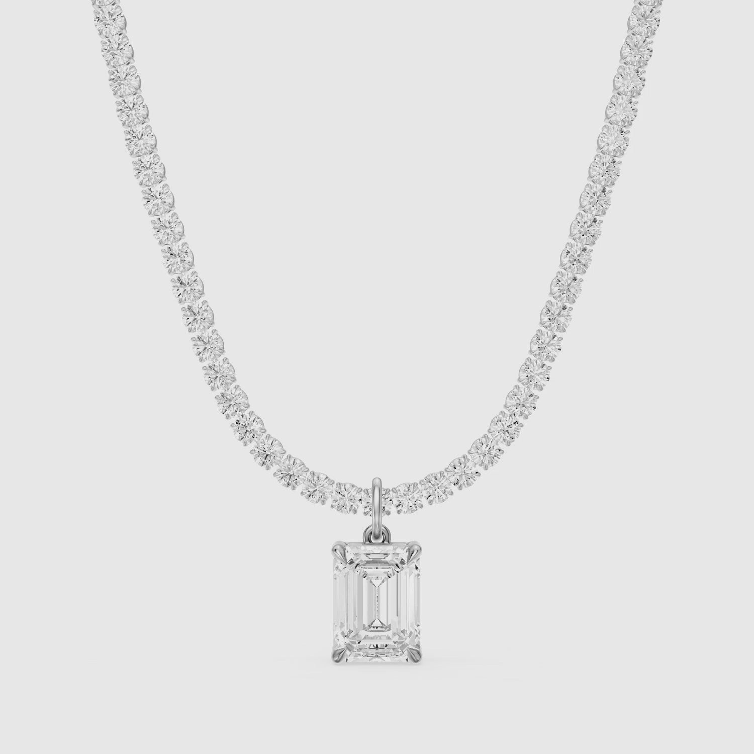 Load video: Madelyn Emerald Cut Lab Grown Diamond Drop Tennis Necklace