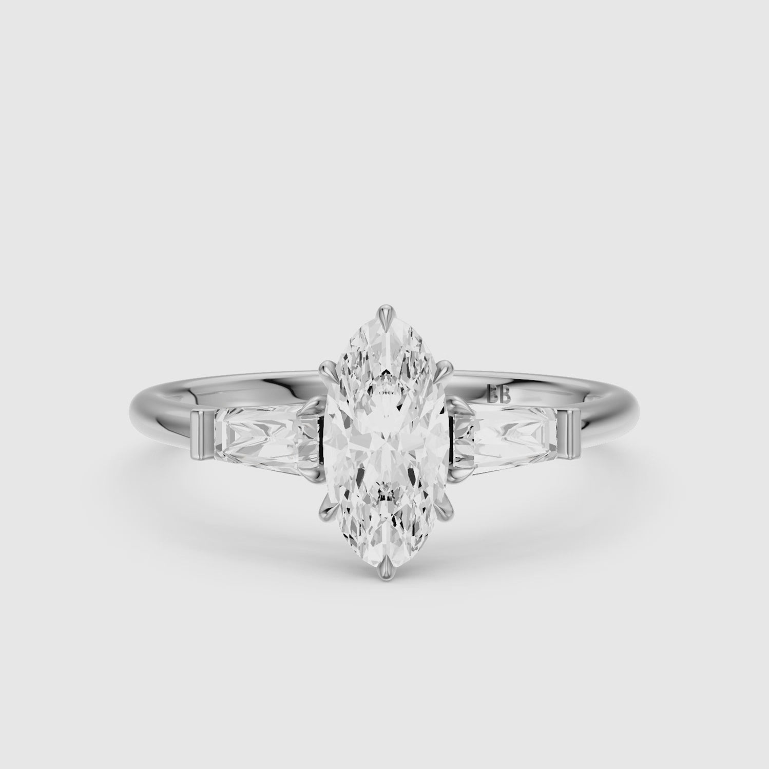 Load video: Letizia Three Stone Moval Moissanite Diamond Ring with Tapered Baguettes