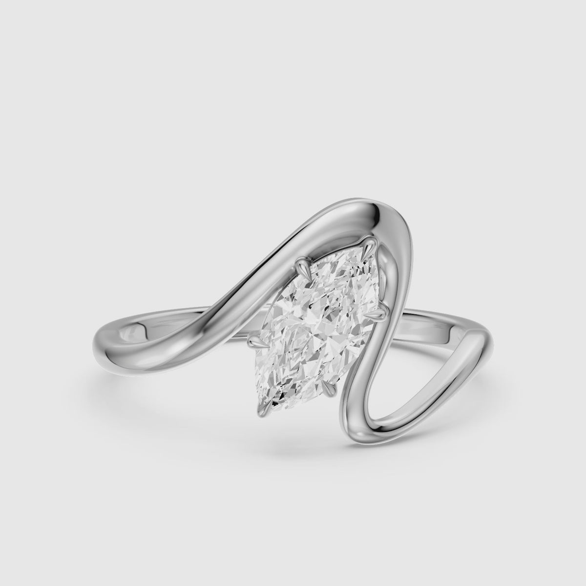 Load video: Enya Marquise Lab Grown Diamond Bypass Wave Solitaire Ring