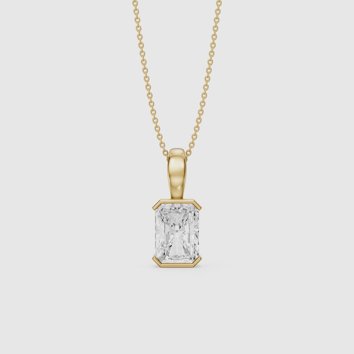 Load video: Helena Half Bezel Radiant Cut Lab Diamond Pendant