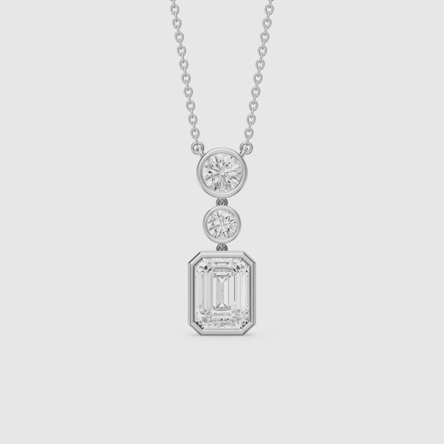 Load video: Adelina Emerald Cut Lab Grown Diamond Drop Bezel Pendant