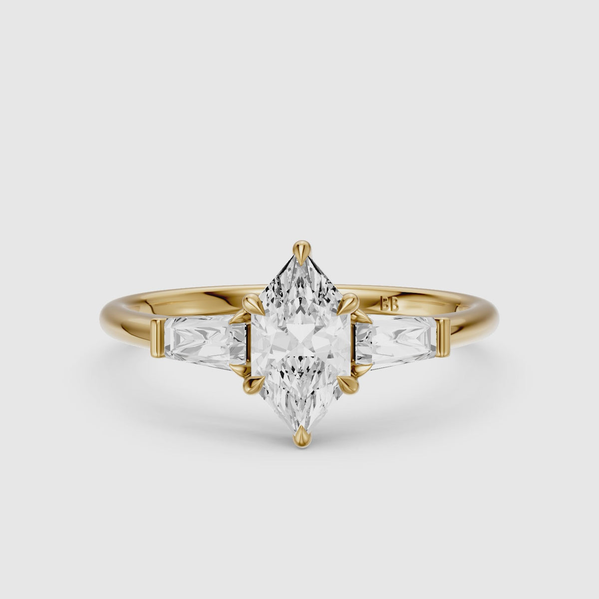 Load video: Dulce Dutch Marquise Lab Grown Diamond Three Stone Ring with Tapered Baguettes