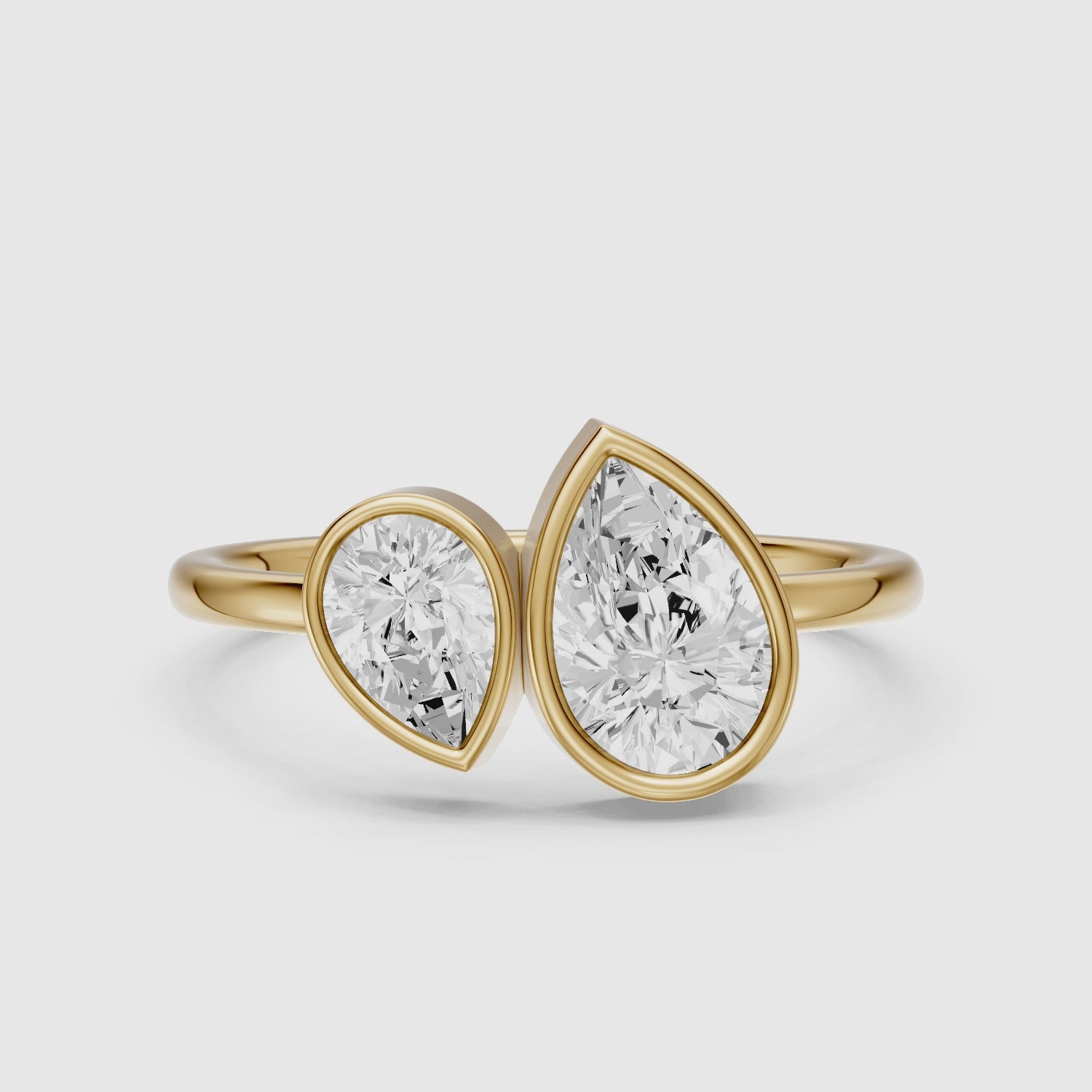 Load video: Nora Toi et Moi Pear Cut Lab Grown Diamond Ring in Bezel Setting