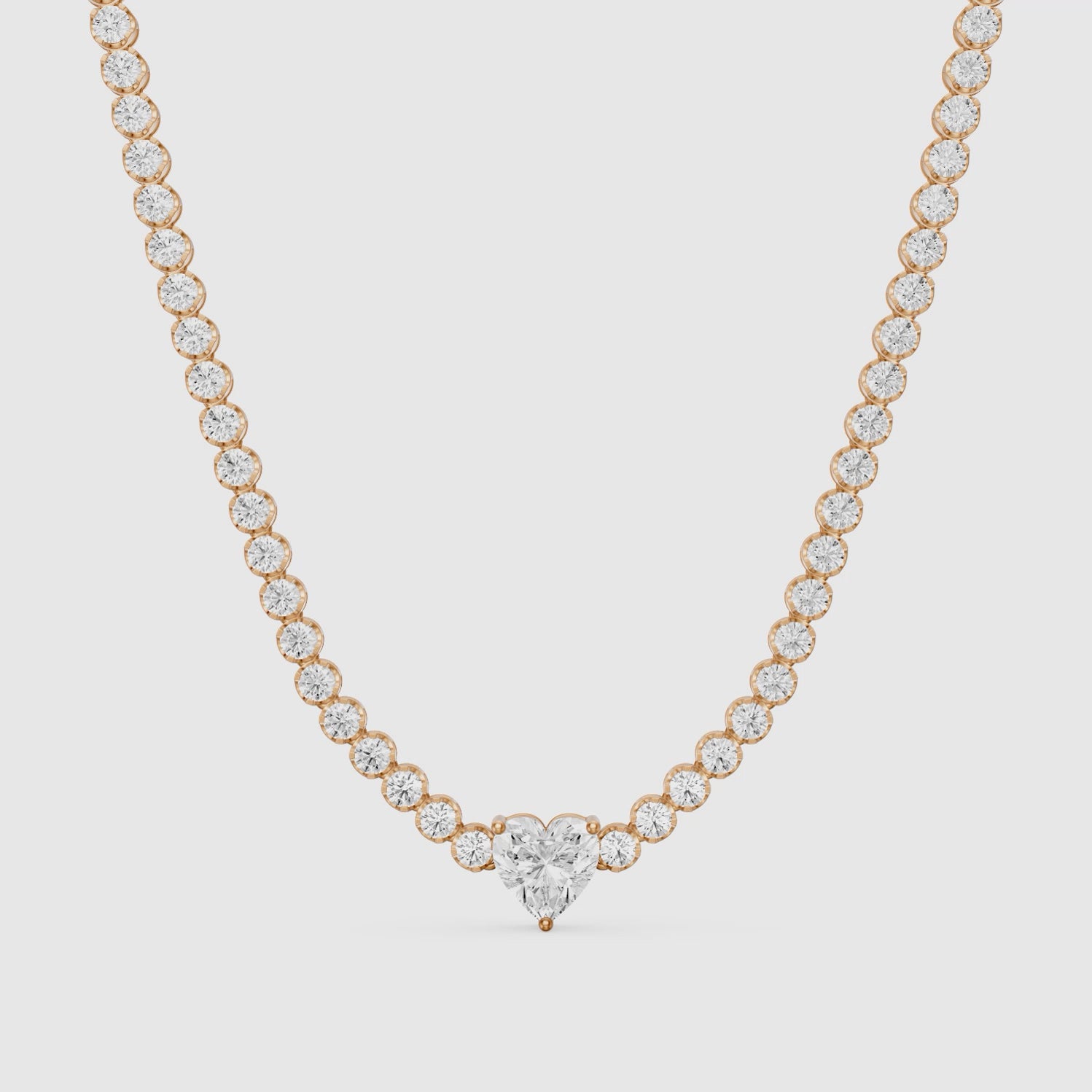 Load video: Mackenzie Round Bezel Lab Grown Diamond Heart Center Necklace
