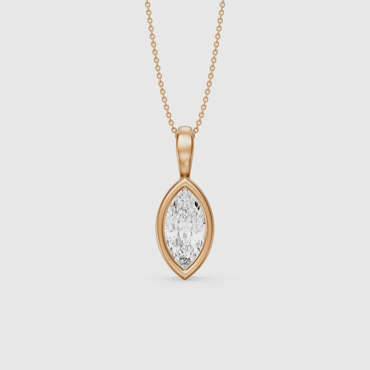Load video: Diora Marquise Bezel Set Lab Grown Diamond Solitaire Pendant