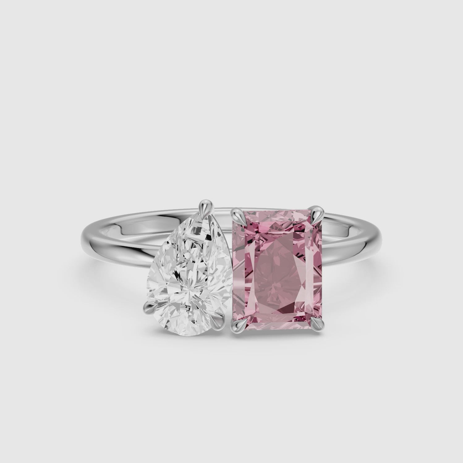 Load video: Liis Pink Radiant and Pear Cut Colored Lab Grown Diamond Toi et Moi Ring