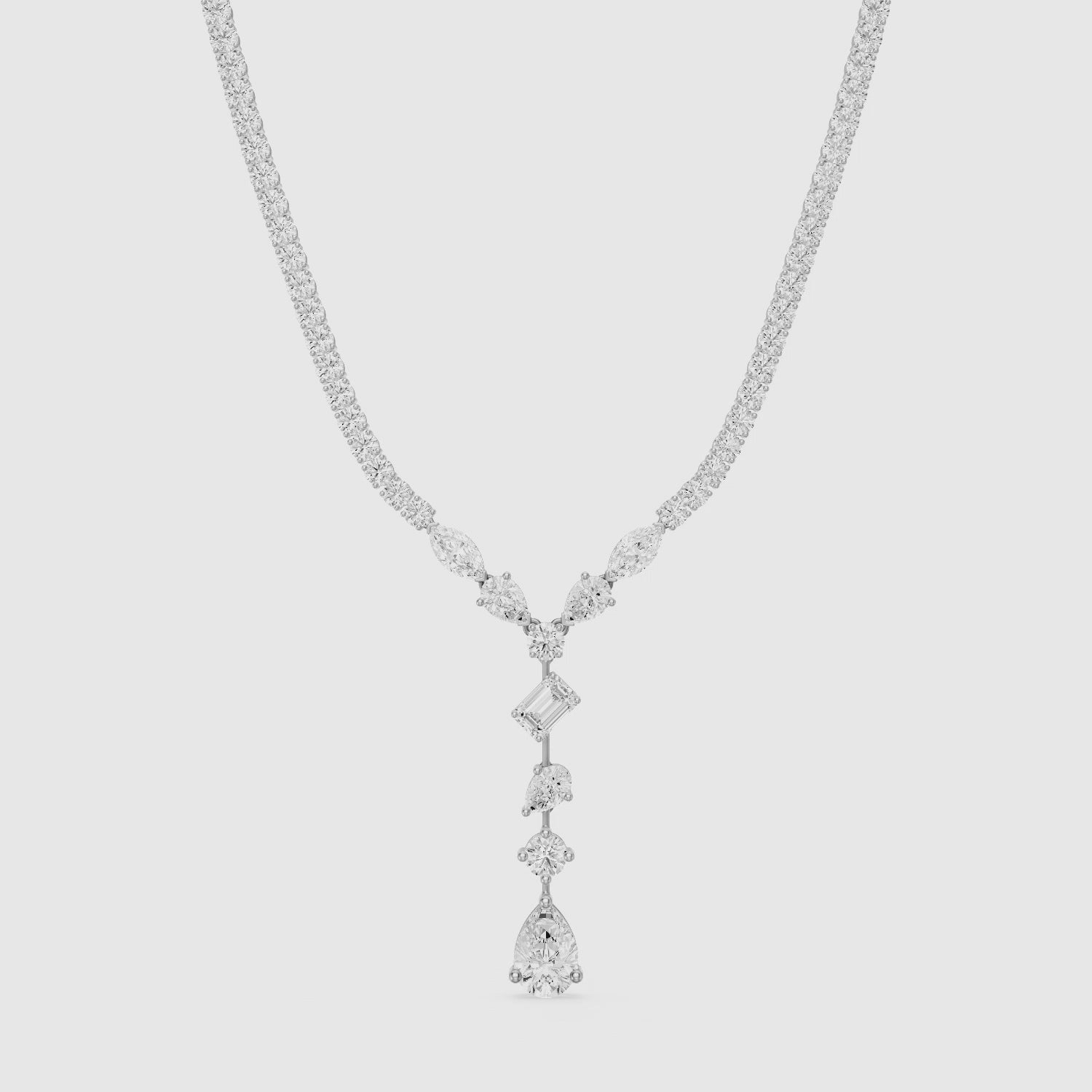 Load video: Yaretzi Pear and Emerald Cut Lab-Diamond Lariat Necklace