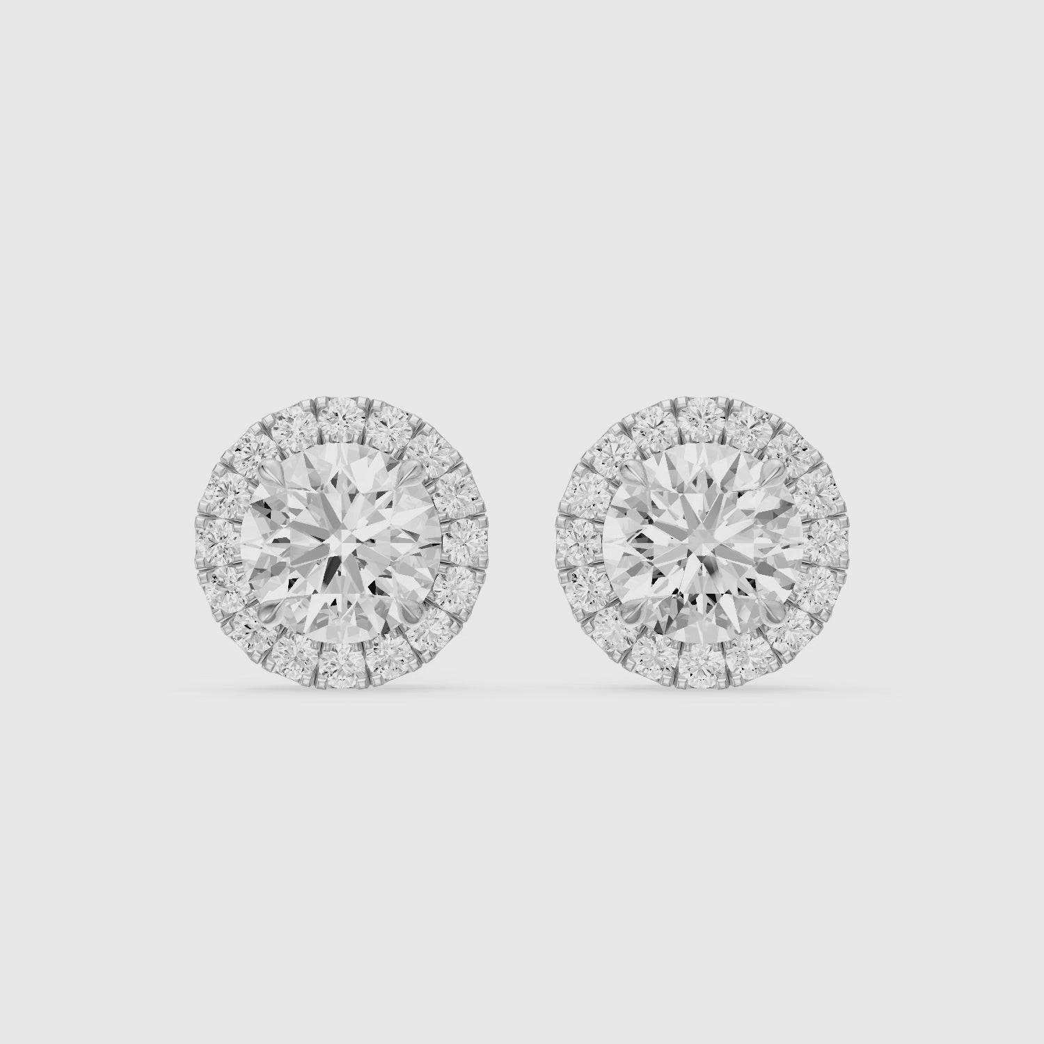 Load video: Teresa Round Cut Lab Grown Diamond Halo Stud Earrings