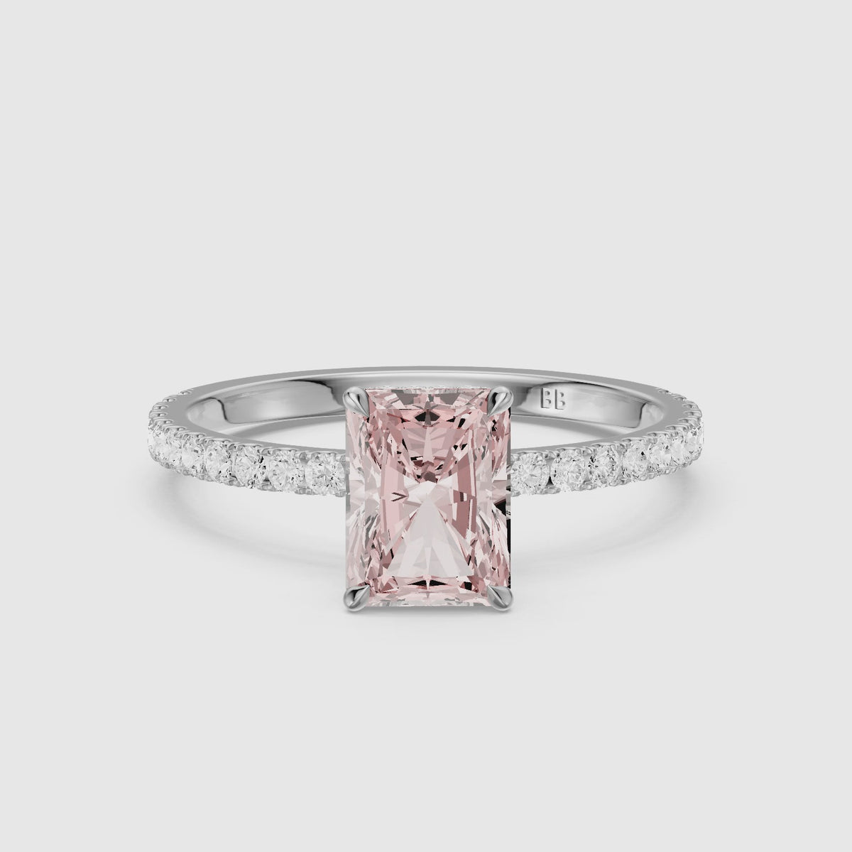 Load video: Eulalie Radiant Cut Hidden Halo Side Stone Pave Pink Lab Grown Diamond Ring