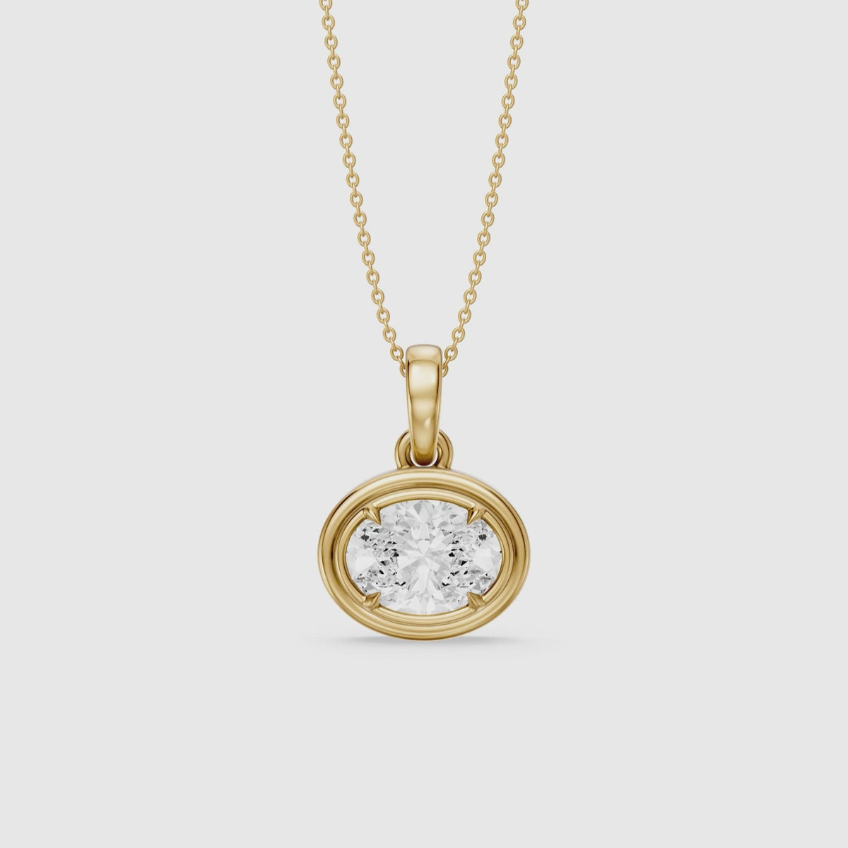Load video: Londyn Oval Cut Lab Grown Diamond Bezel with Prong Pendant