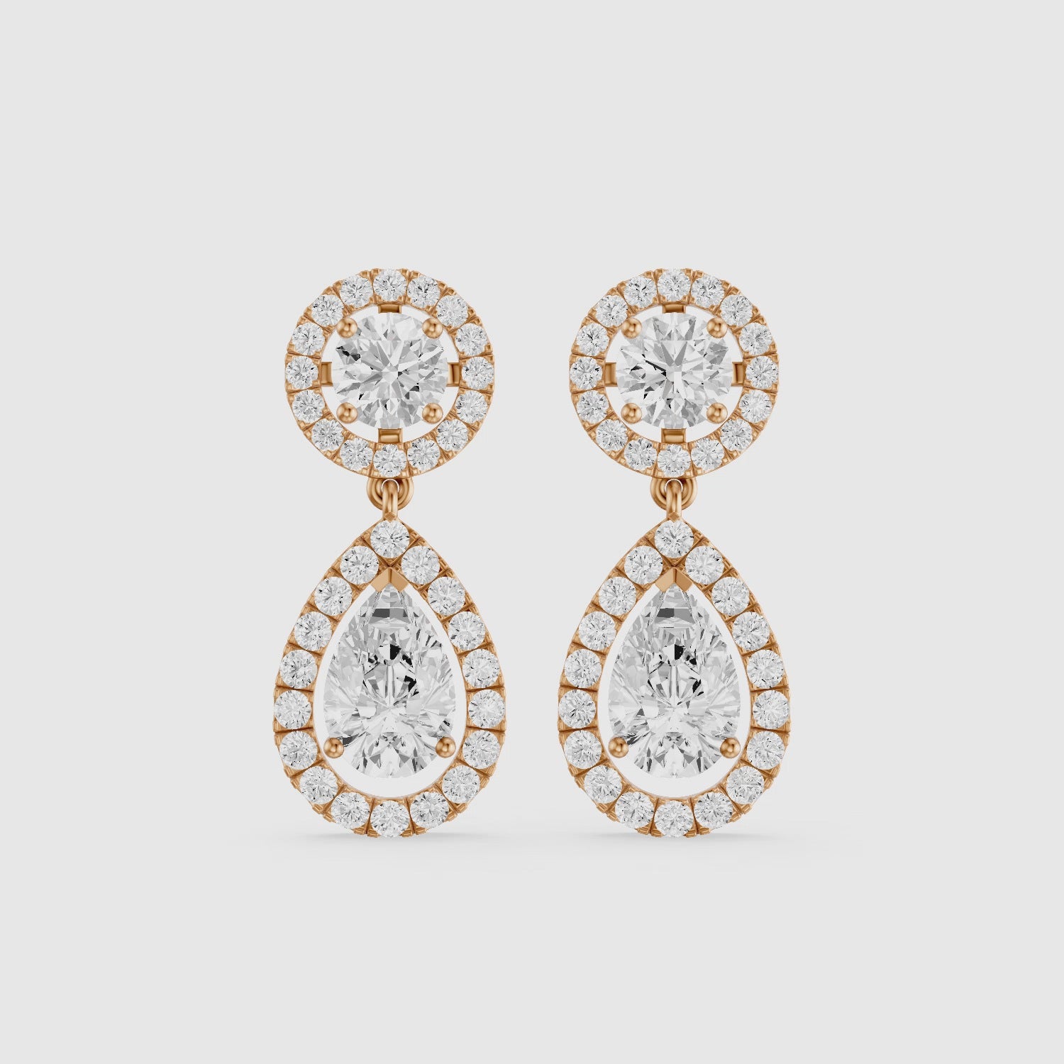 Load video: Echo Round and Pear Shaped Halo Lab Grown Diamond Drop Earrings