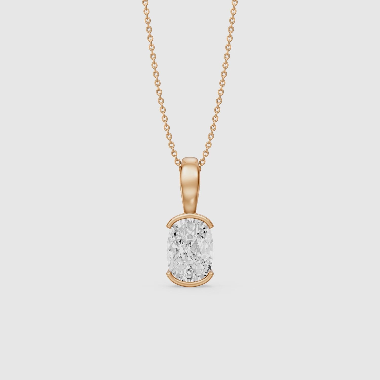 Load video: Raya Elongated Cushion Half Bezel Lab Grown Diamond Pendant