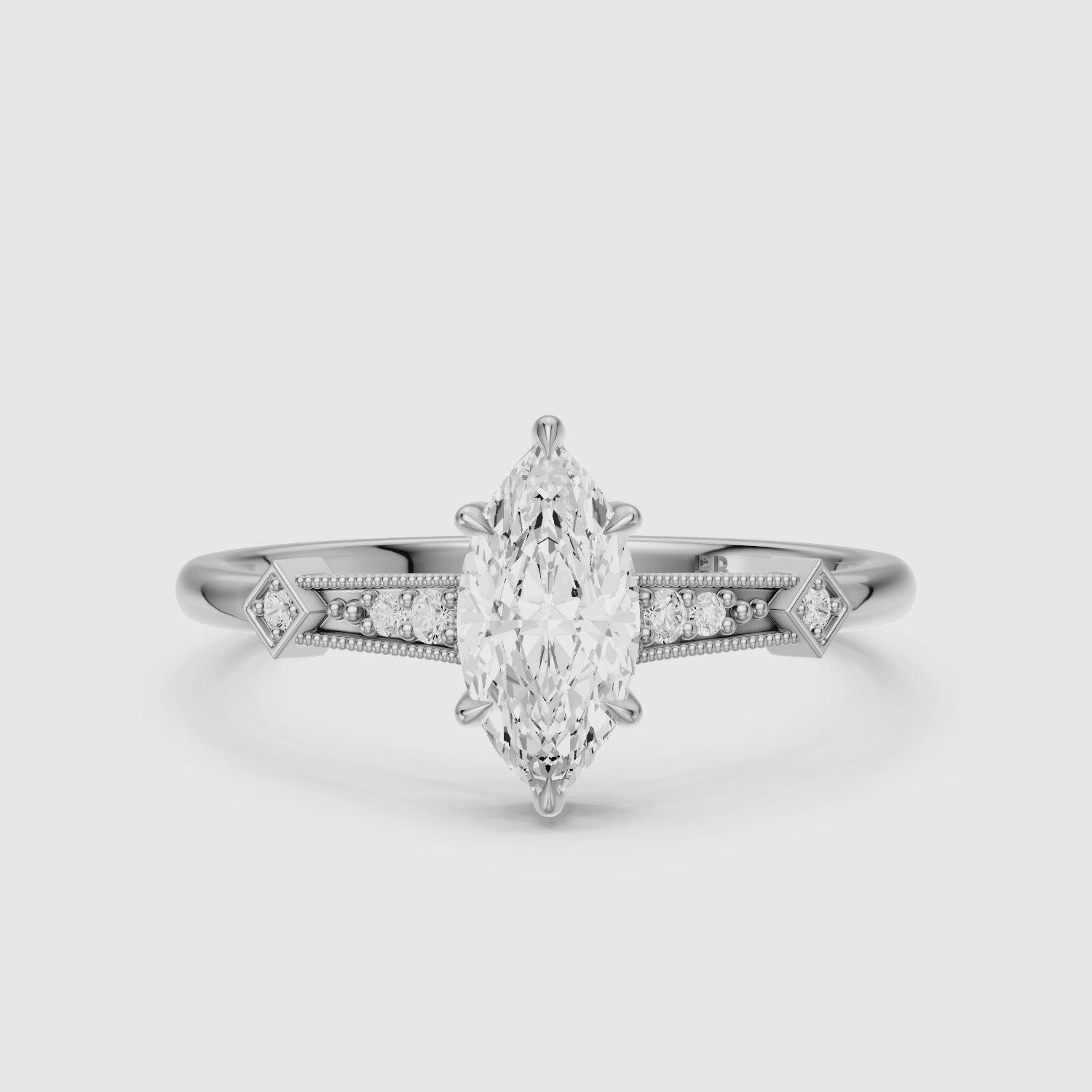 Load video: Ada Marquise Cut Side Stone Lab Grown Diamond Ring with Vintage Milgrain