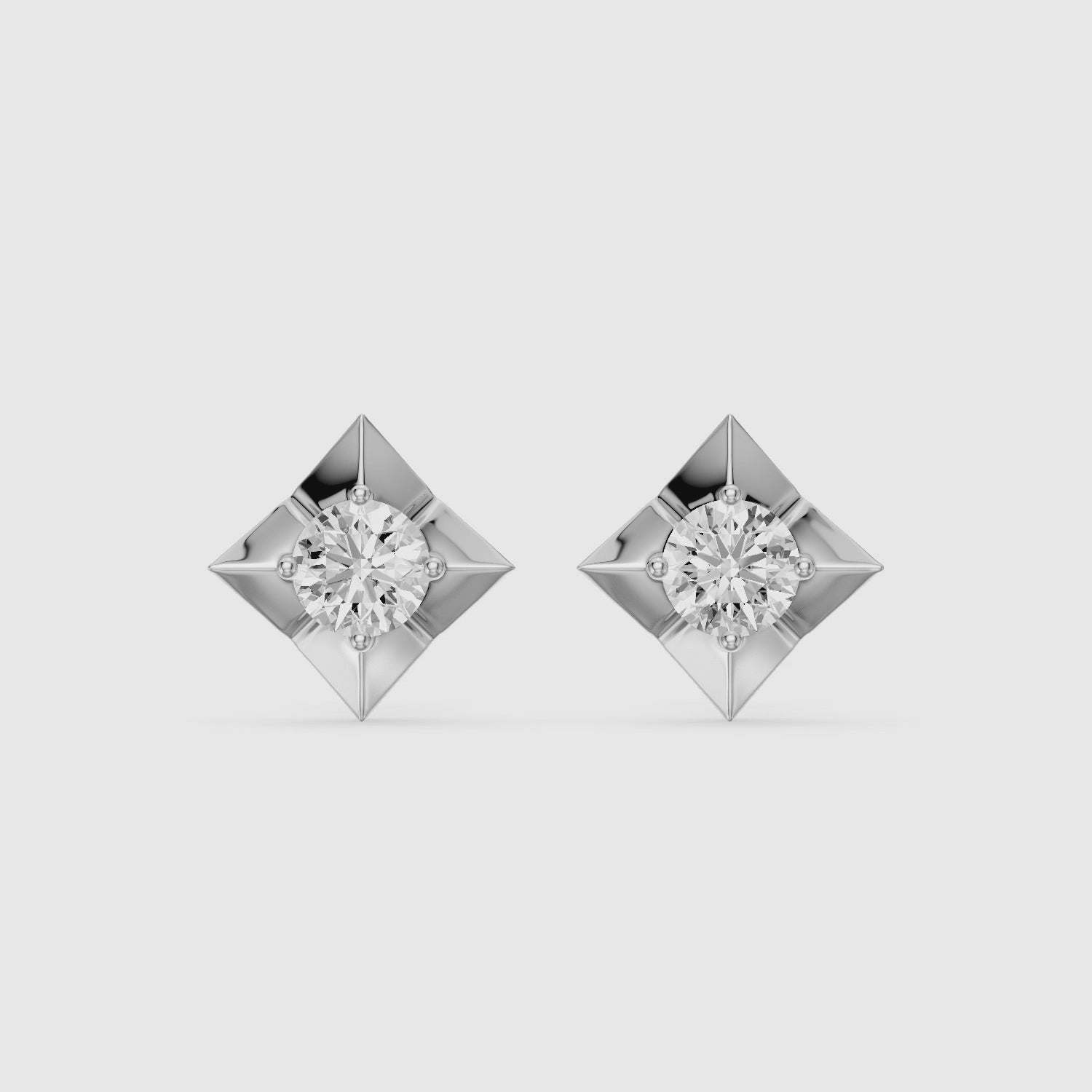 Load video: Xanthe Round Lab Grown Diamond Four Prong Solitaire Stud Earrings