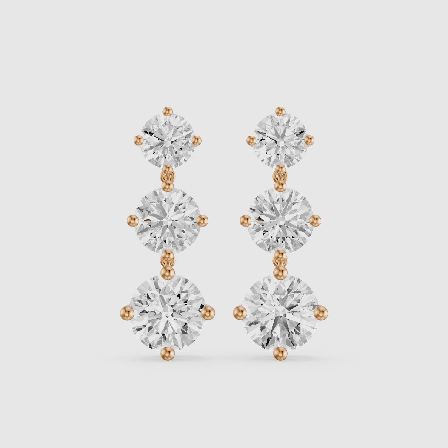 Load video: Danica Round Lab Grown Diamond Three Stone Graduated Drop Earrings
