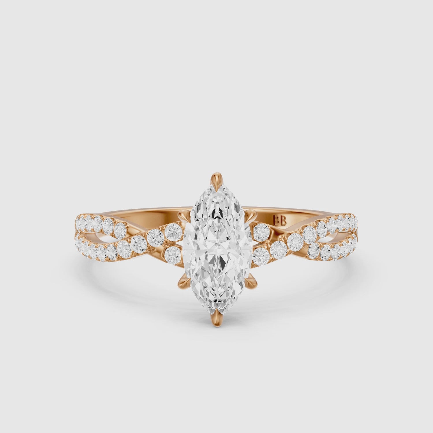 Load video: Freya Marquise Cut Moissanite Diamond Ring with Twisted Pavé Band