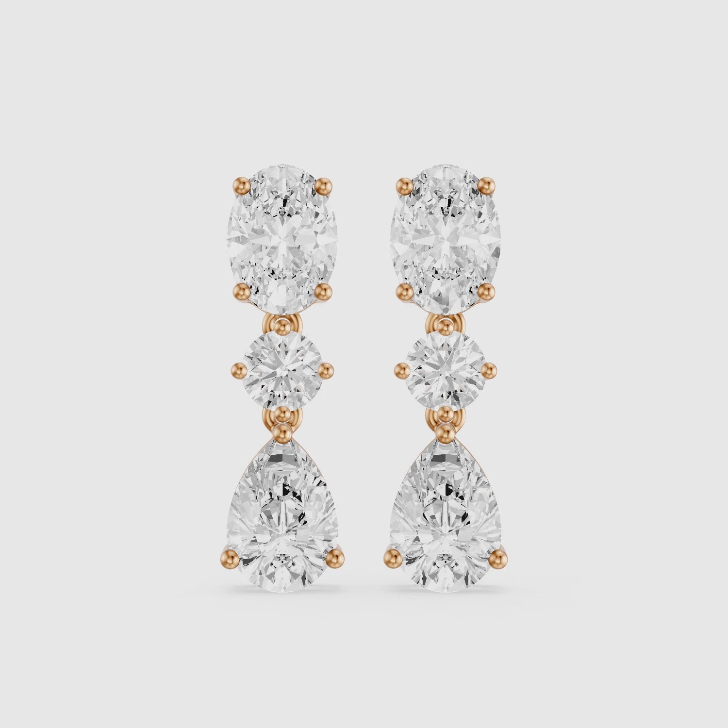 Load video: Iliana Oval, Round and Pear Cut Lab Grown Diamond Dangle Earrings