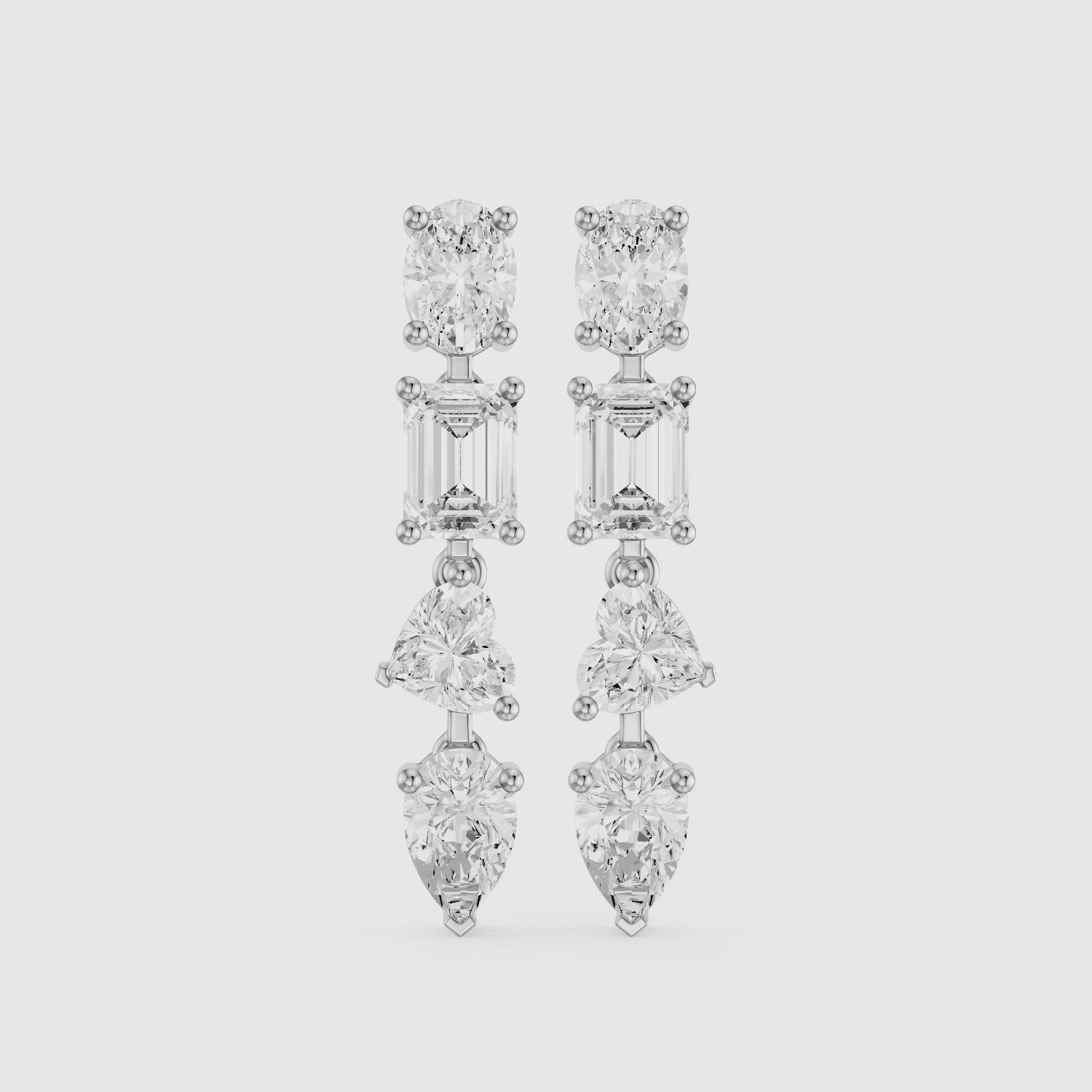 Load video: Queenie Oval, Emerald Cut, Heart, and Pear Lab Grown Diamond Drop Earrings