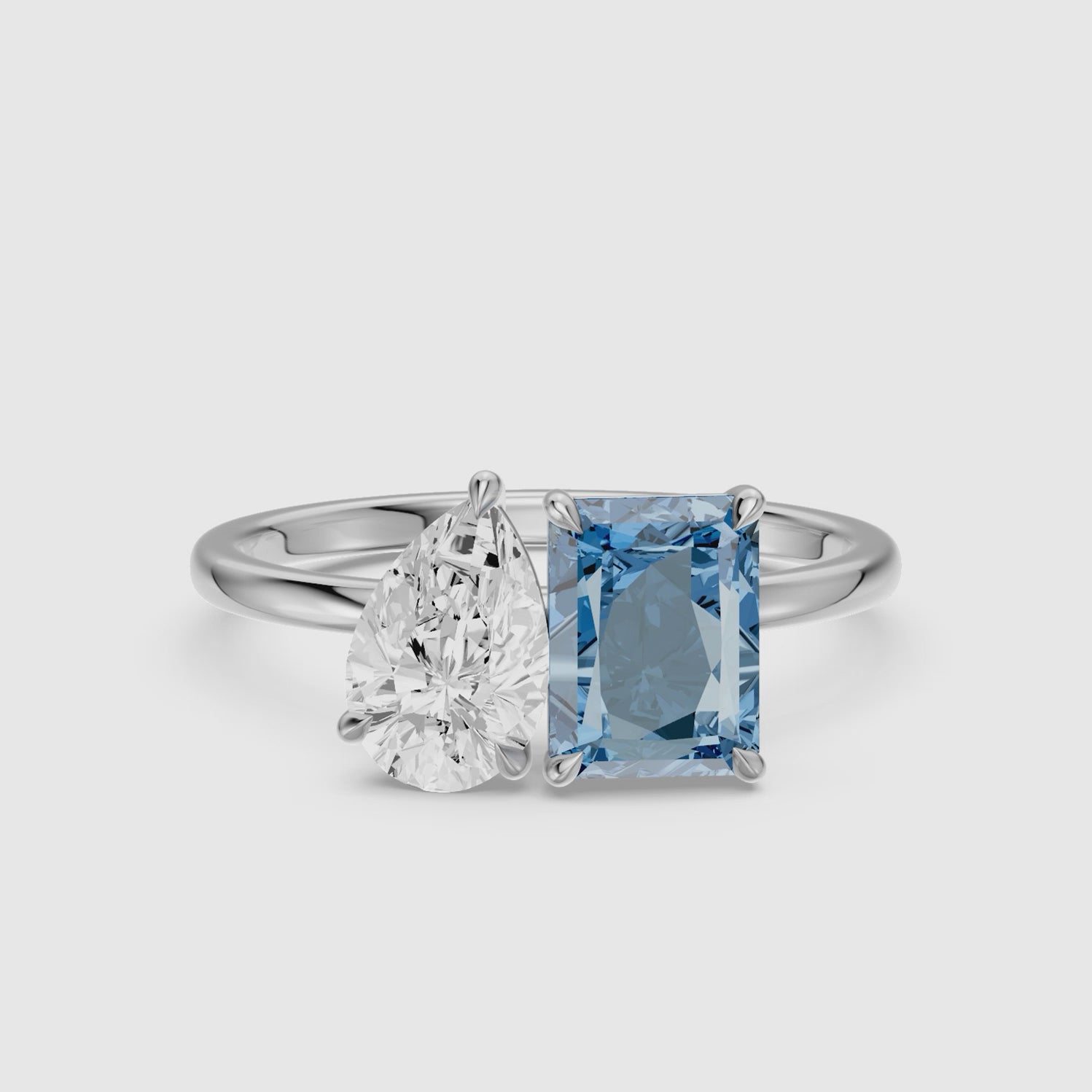 Load video: Milica Blue Radiant and Pear Cut Colored Lab Grown Diamond Toi et Moi Ring