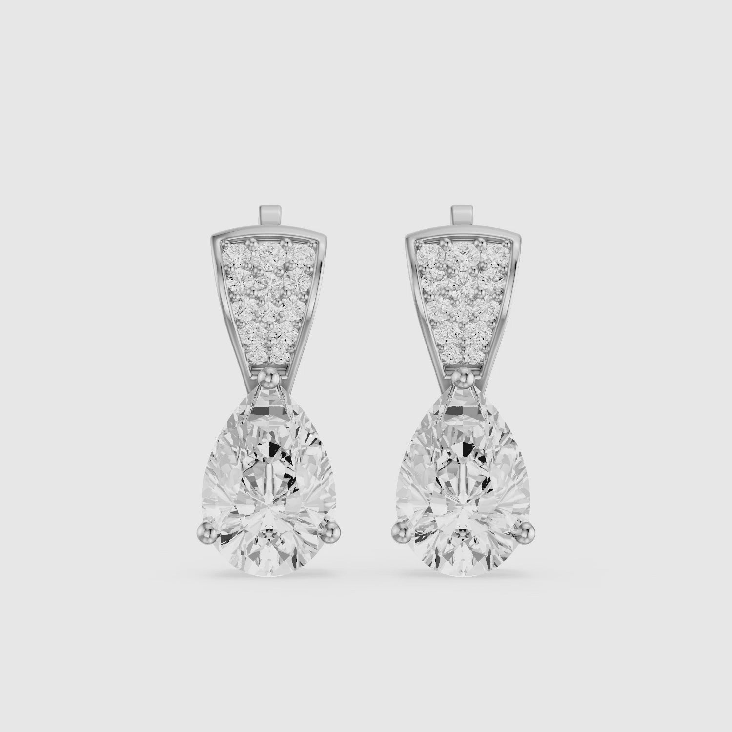 Load video: Bonnie Pear and Round Lab Grown Diamond Drop Stud Earrings