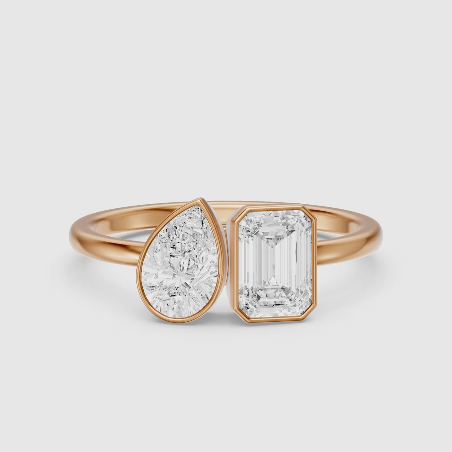 Load video: Cierra Toi Et Moi Bezel Diamond Ring With Pear and Emerald Two Stone Lab Grown Diamond