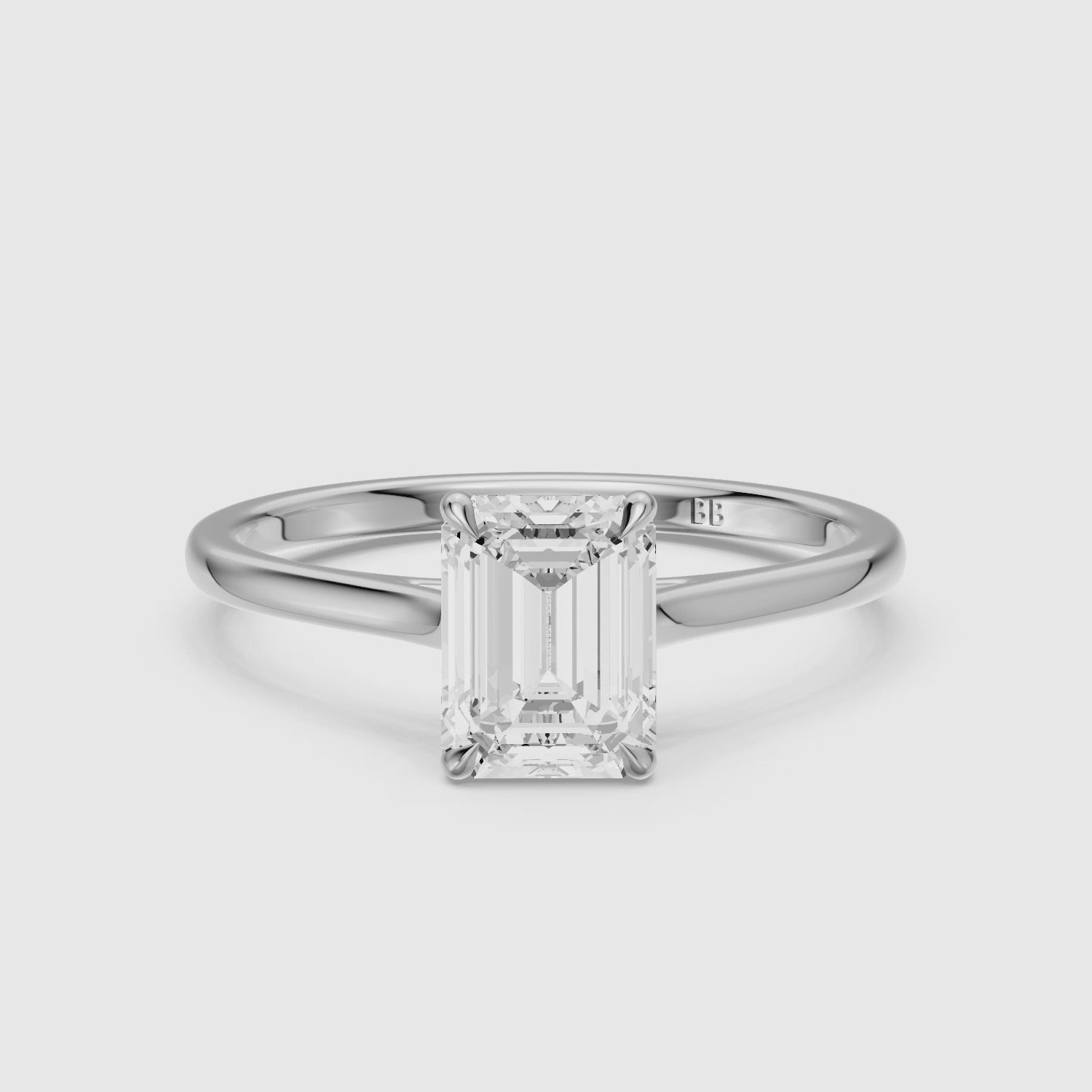 Load video: Emmali Emerald Cut Solitaire Cathedral Style Lab Grown Diamond Ring