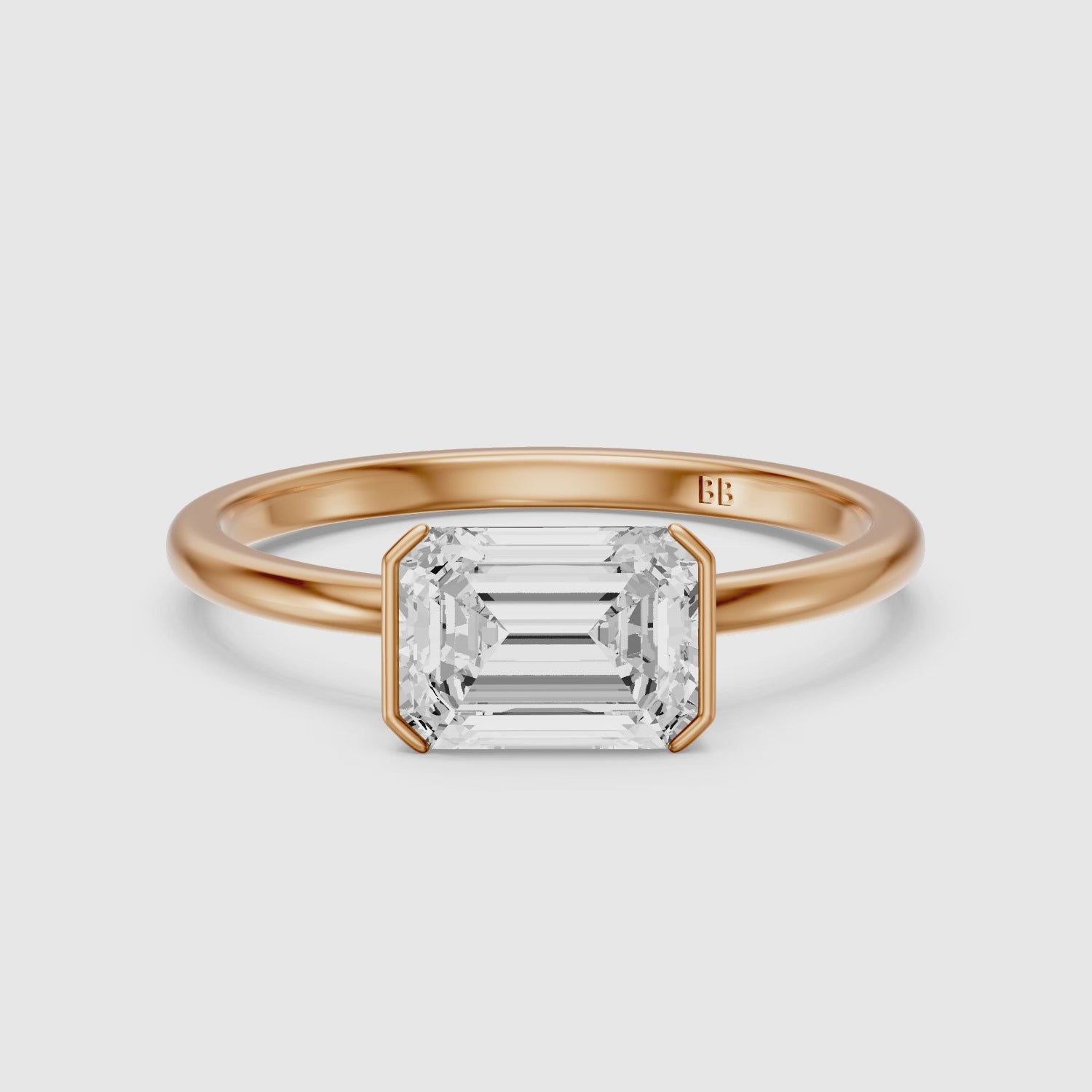 Load video: Kennedy Emerald Cut East West Half Bezel Lab Grown Diamond Ring