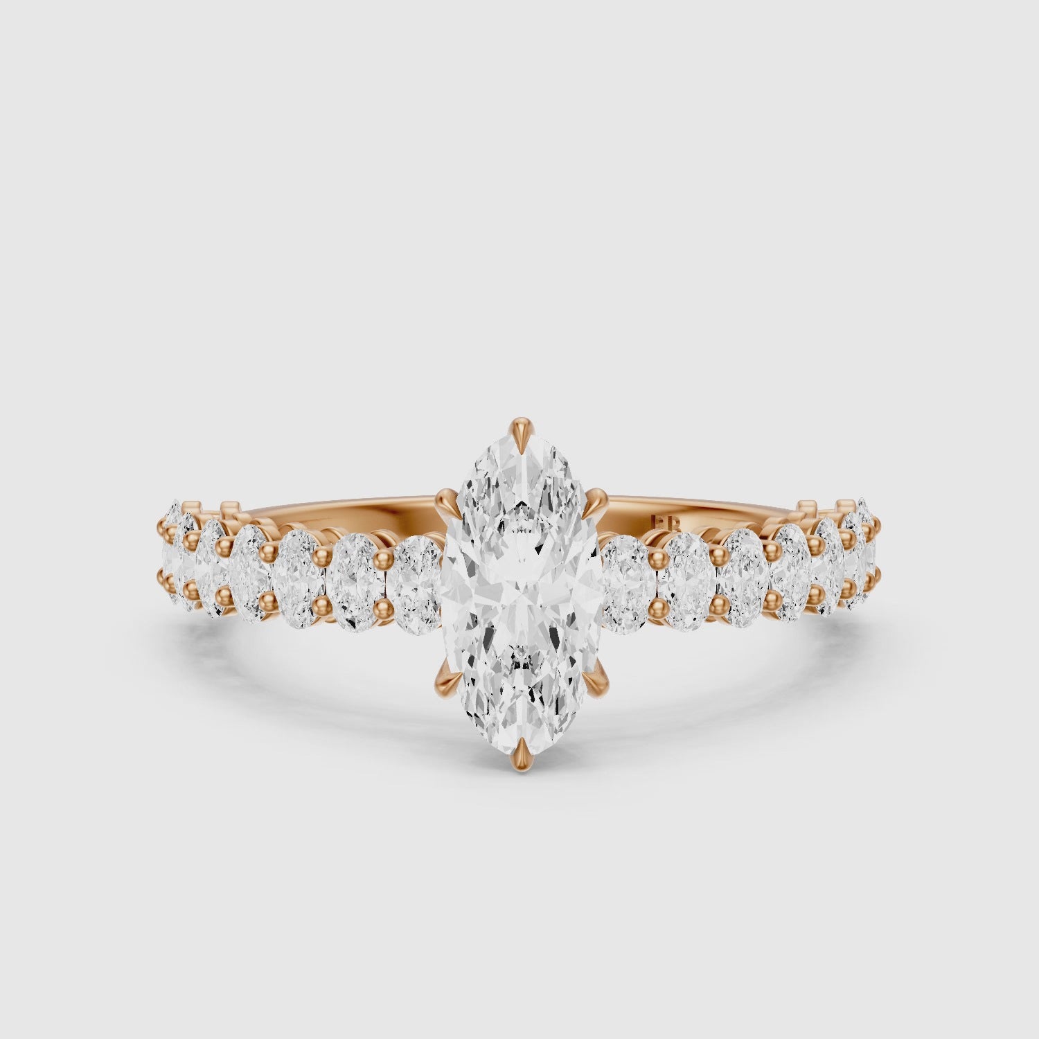 Load video: Sybil Moval Cut Moissanite Diamond Ring with Oval Side Diamond Band