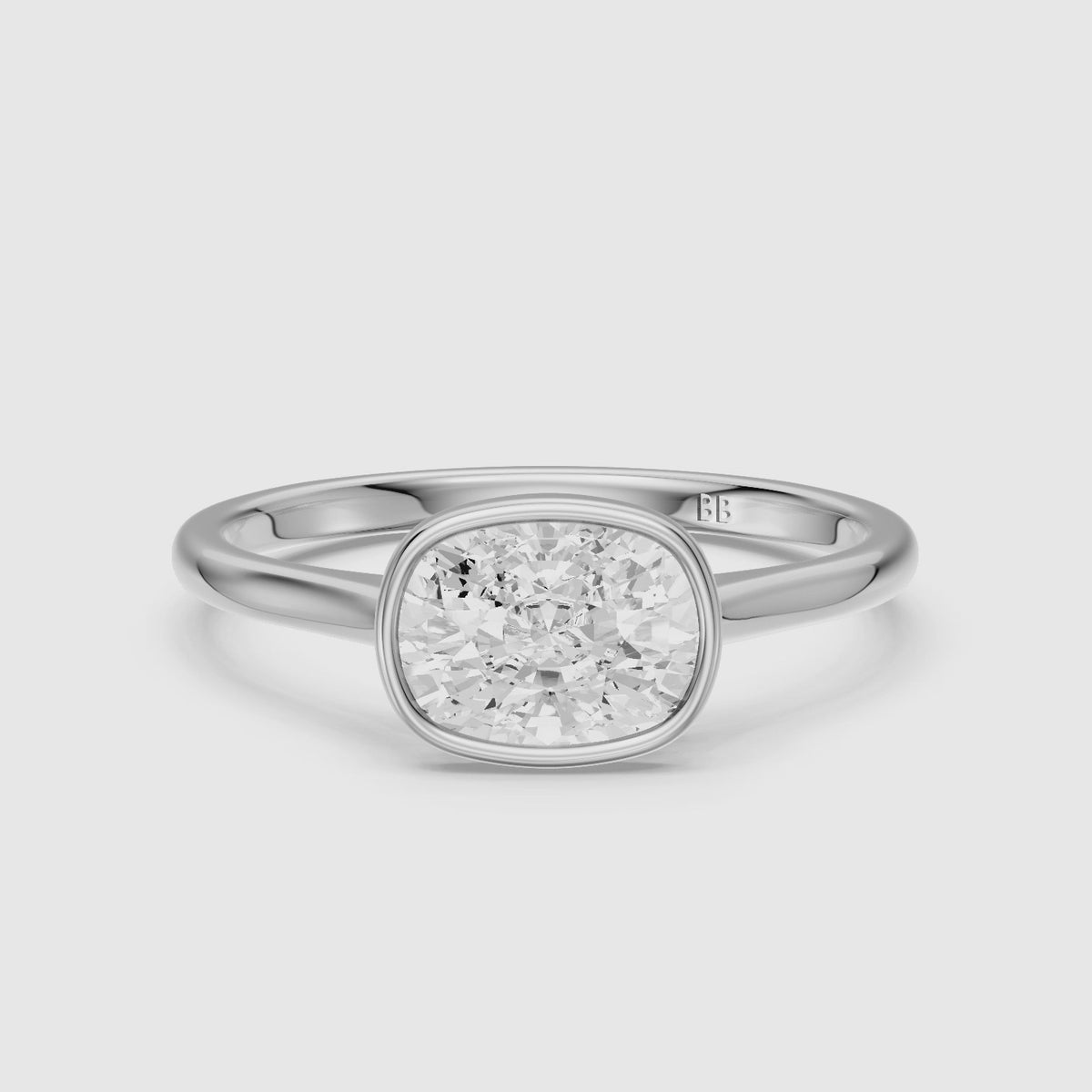 Load video: Yuna East West Cushion Lab Grown Diamond Bezel Set Solitaire Ring