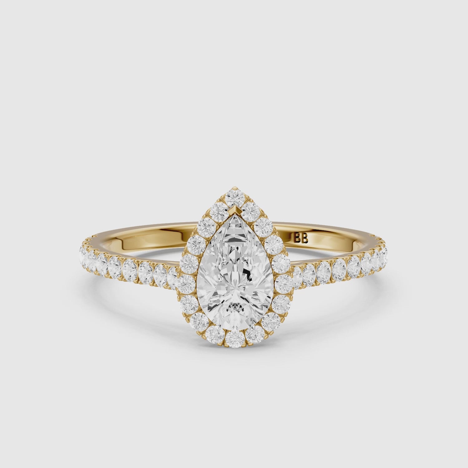 Load video: Joelle Pear Cut Halo Pave Side Stone Lab Grown Engagement Ring