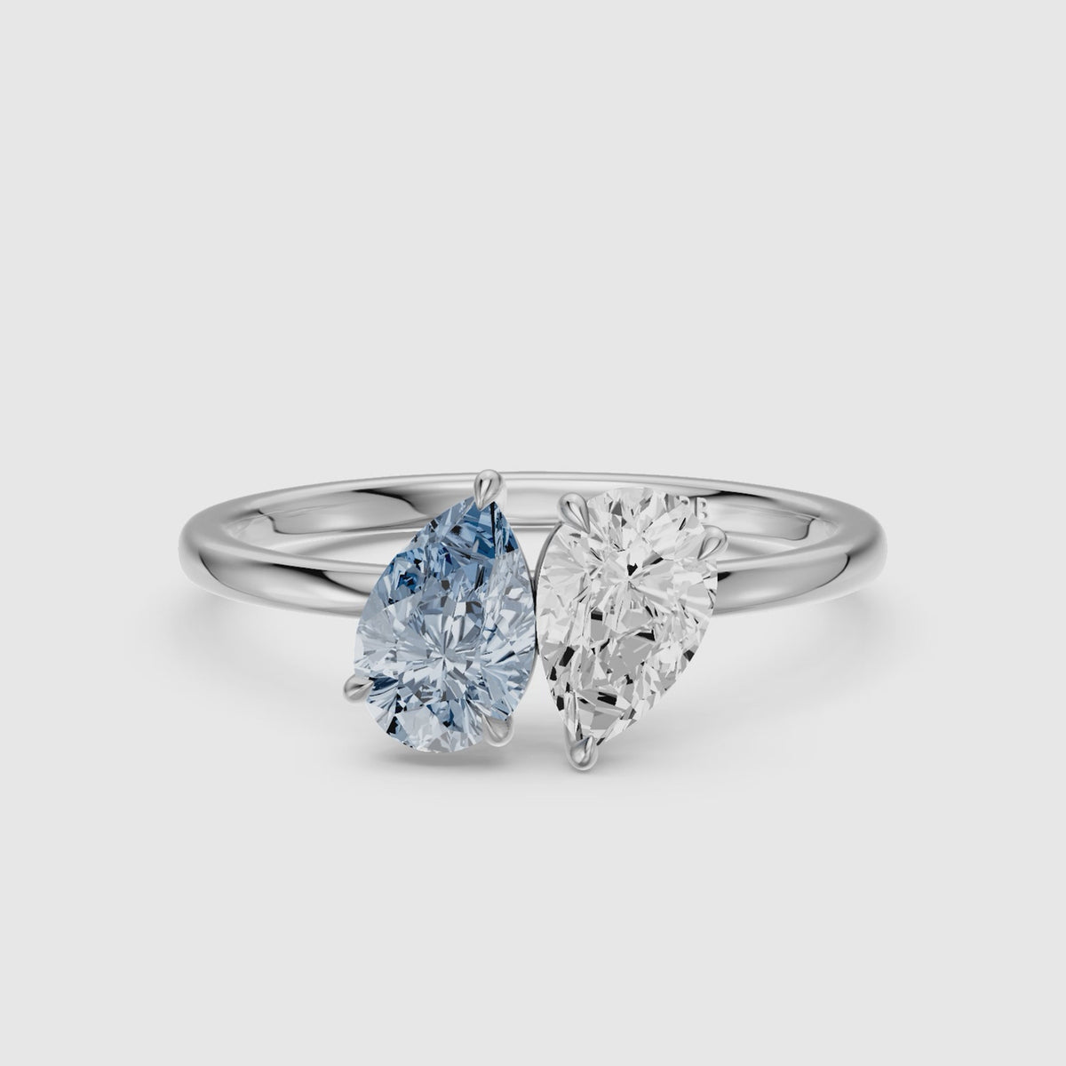 Load video: Axelle Blue and White Both Pear Cut Color Lab Grown Diamond Toi et Moi Ring