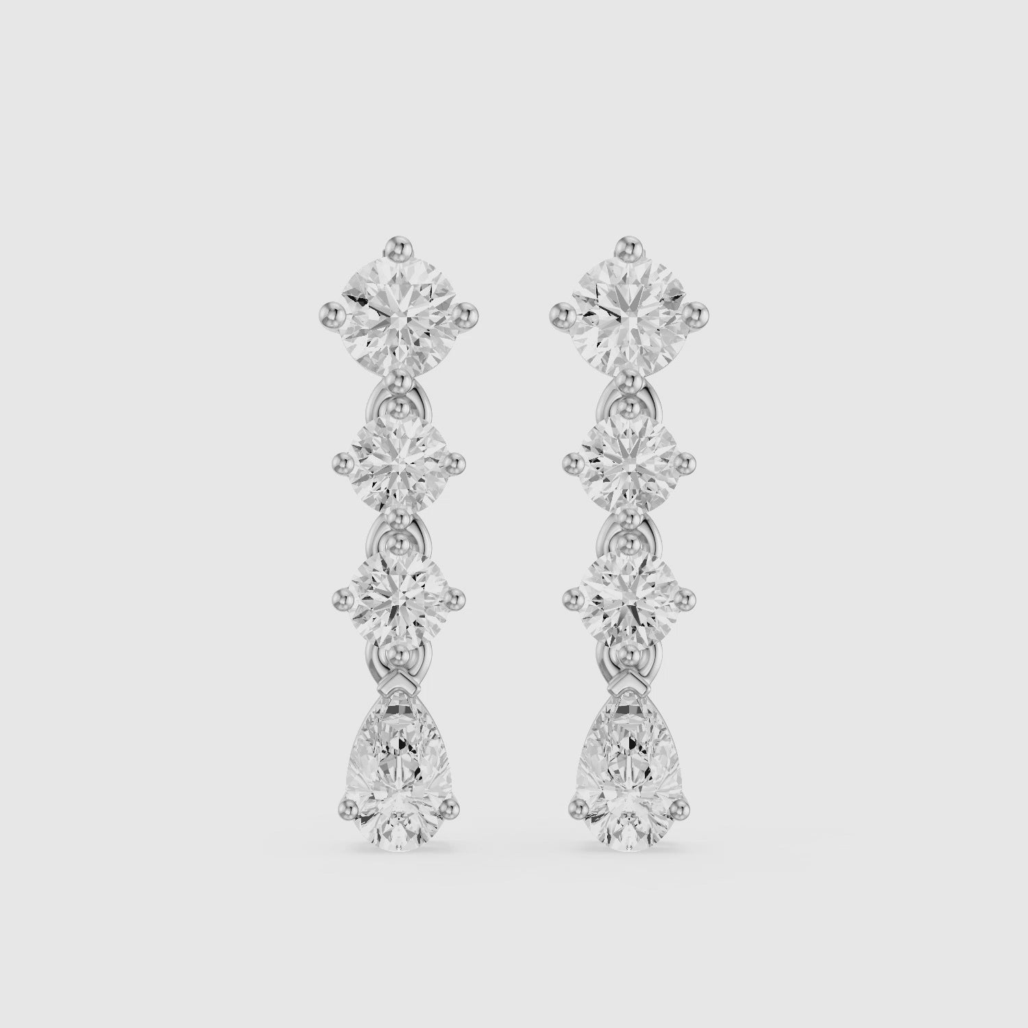 Load video: Willow Round and Pear Lab Grown Diamond Linear Drop Earrings