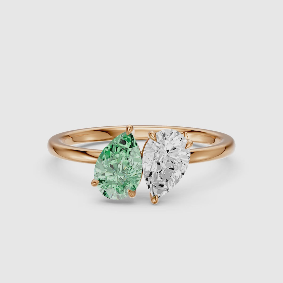 Load video: Asta Green and White Both Pear Cut Color Lab Grown Diamond Toi et Moi Ring