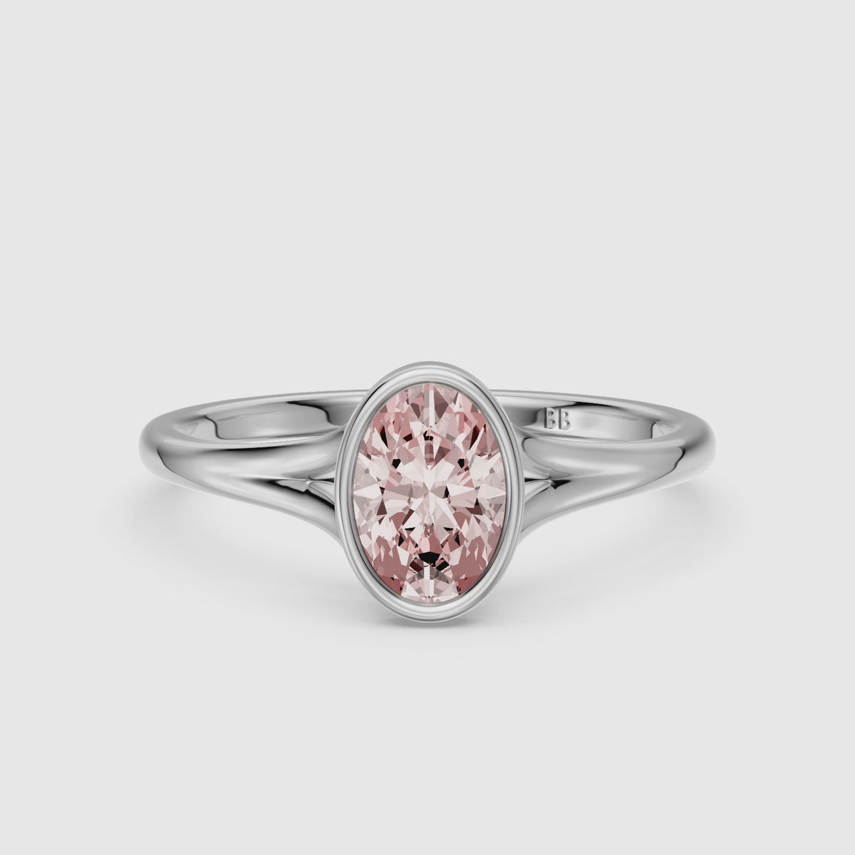 Load video: Elliot Oval Cut Pink Lab Grown Diamond Ring in Bezel Set Split Shank Style