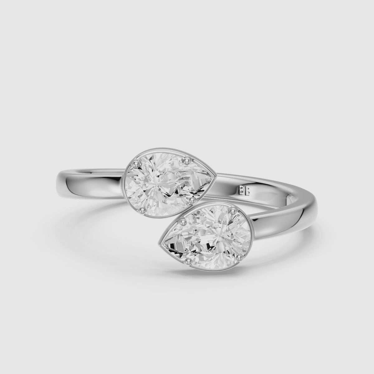 Load video: Vyla Pear Lab Grown Diamond Toi et Moi Solitaire Engagement Ring