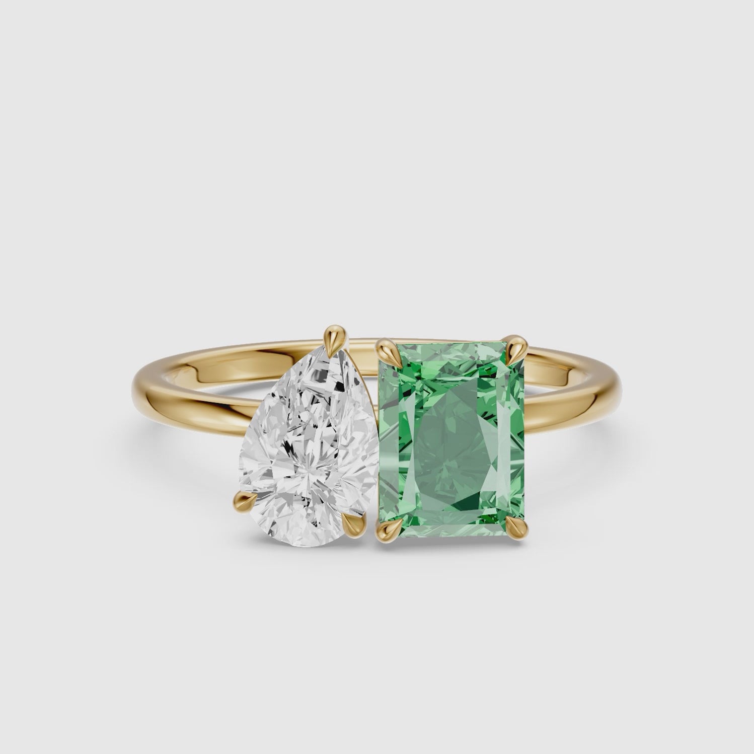 Load video: Cybele Green Radiant and Pear Cut Colored Lab Grown Diamond Toi et Moi Ring