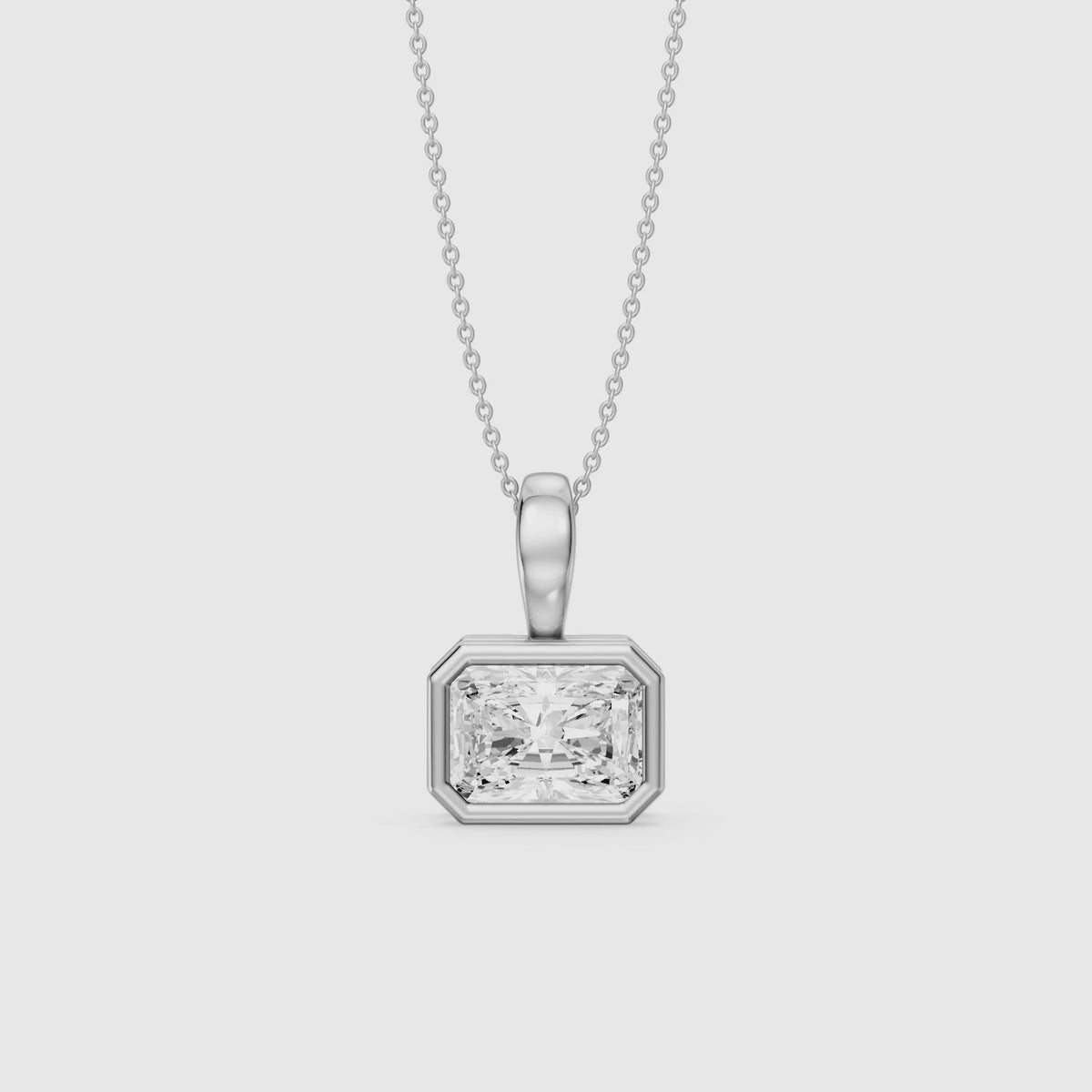 Load video: Maryam East West Radiant Cut Lab Grown Diamond Bezel Pendant