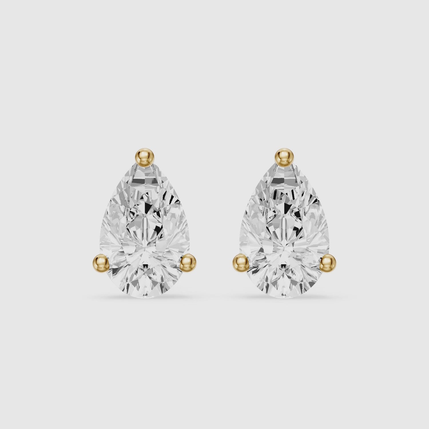 Load video: Eirlys Pear Cut Lab Grown Diamond Teardrop Solitaire Earrings