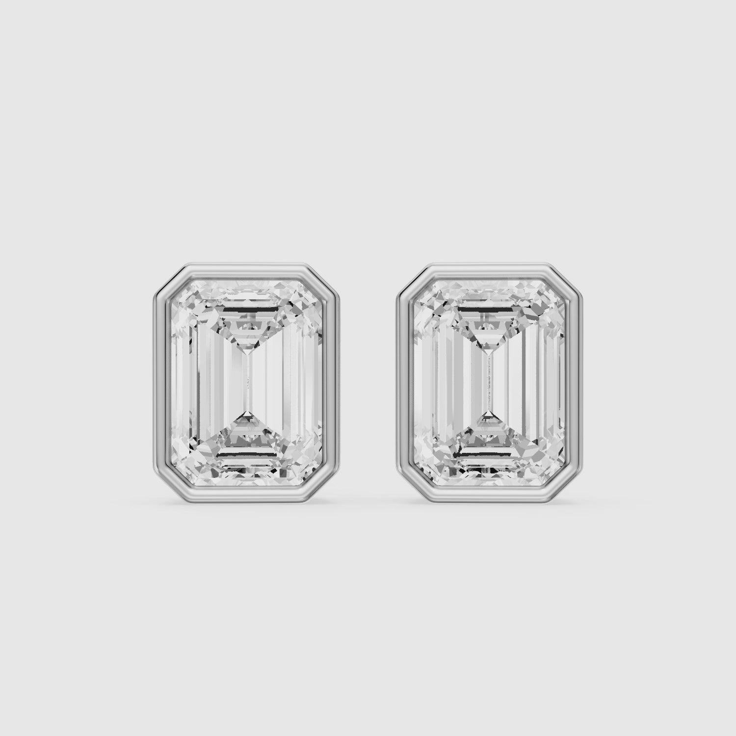 Load video: Miriam Emerald Cut Lab Grown Diamond Bezel Set Stud Earrings