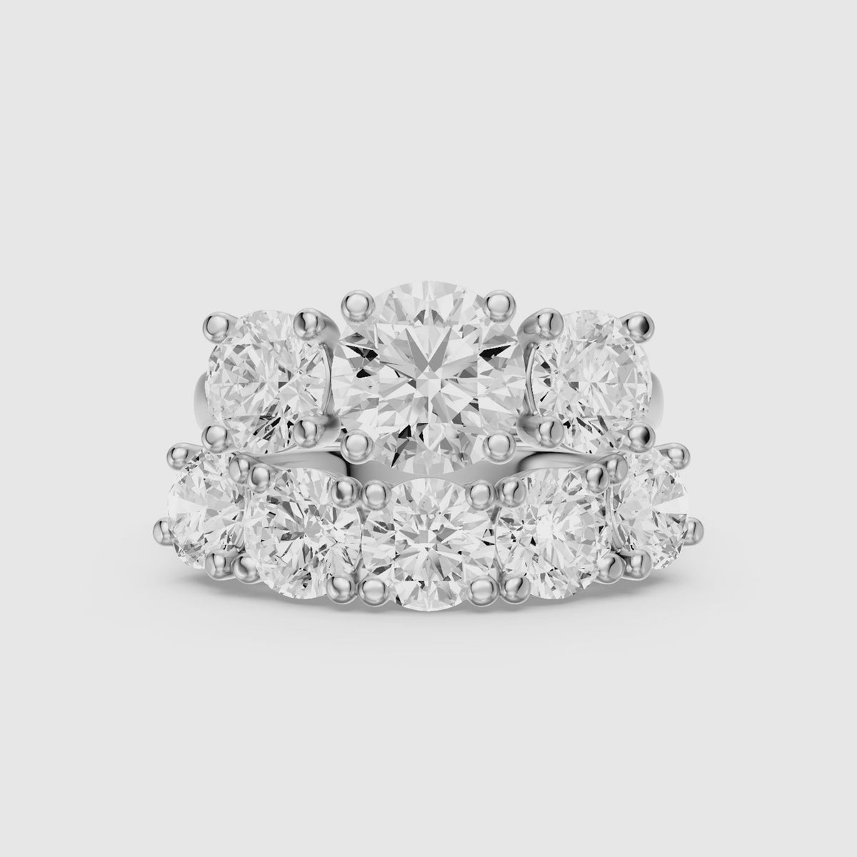 Load video: Eloa Three Stone Round Lab Grown Diamond Cluster Ring Guard Bridal Set