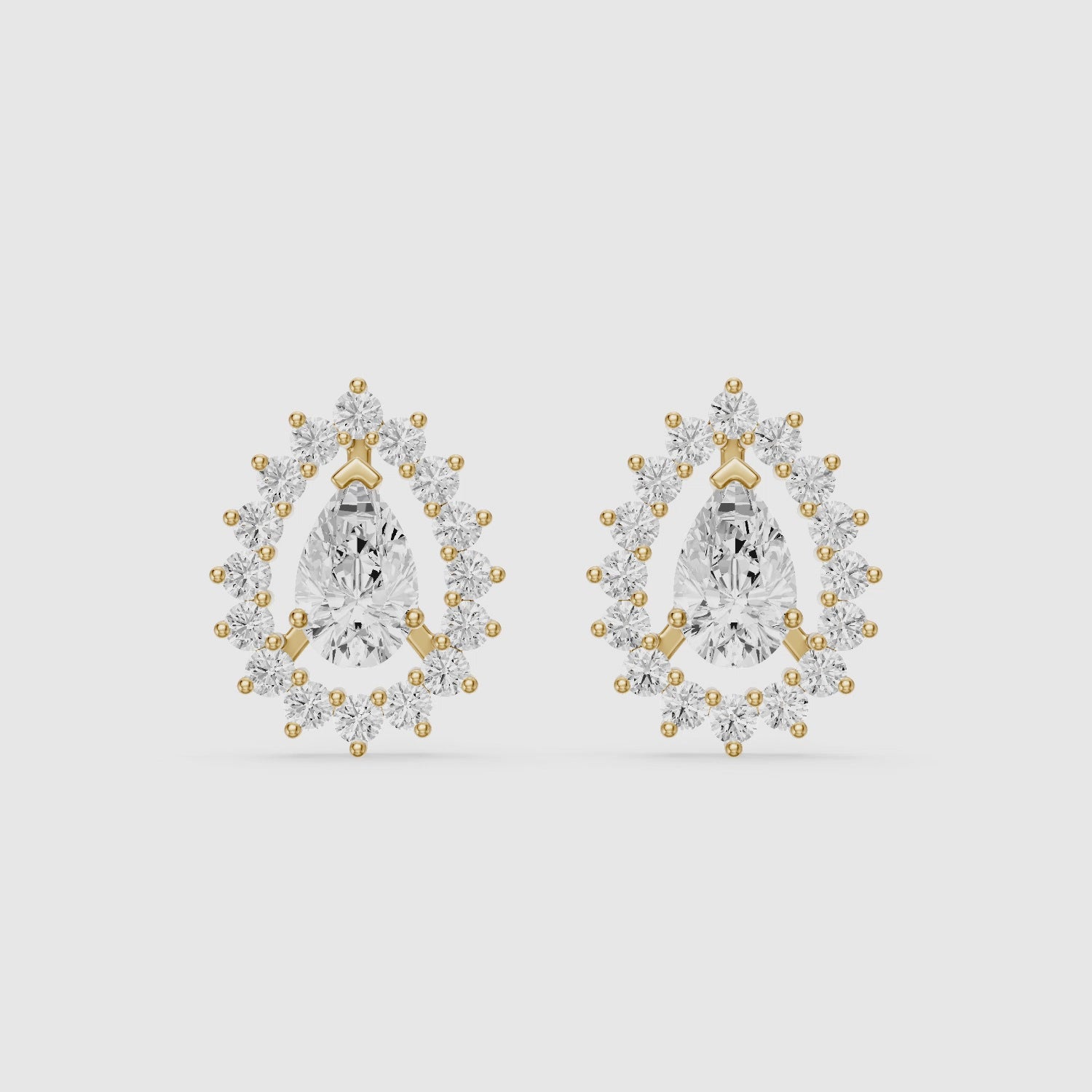 Load video: Zana Pear and Round Lab Grown Diamond Halo Stud Earrings
