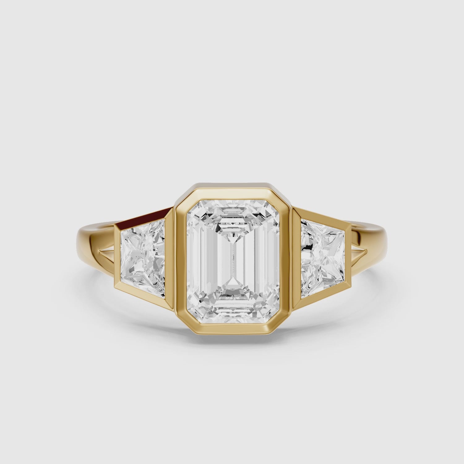 Load video: Stevie Emerald Cut Lab Grown Diamond Bezel Ring with Trapezoid Side Stones