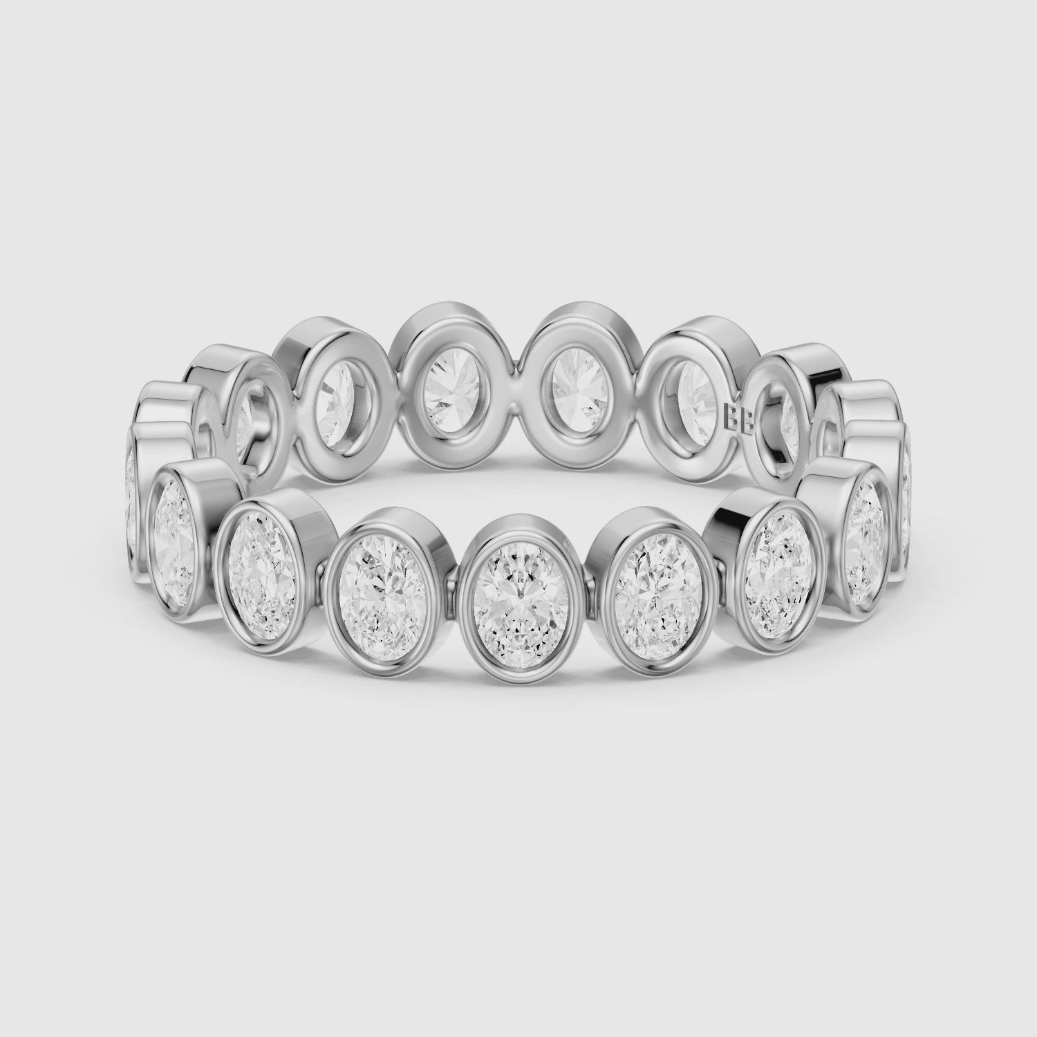 Load video: Rhea Bezel Set Oval Lab Grown Diamond Eternity Band