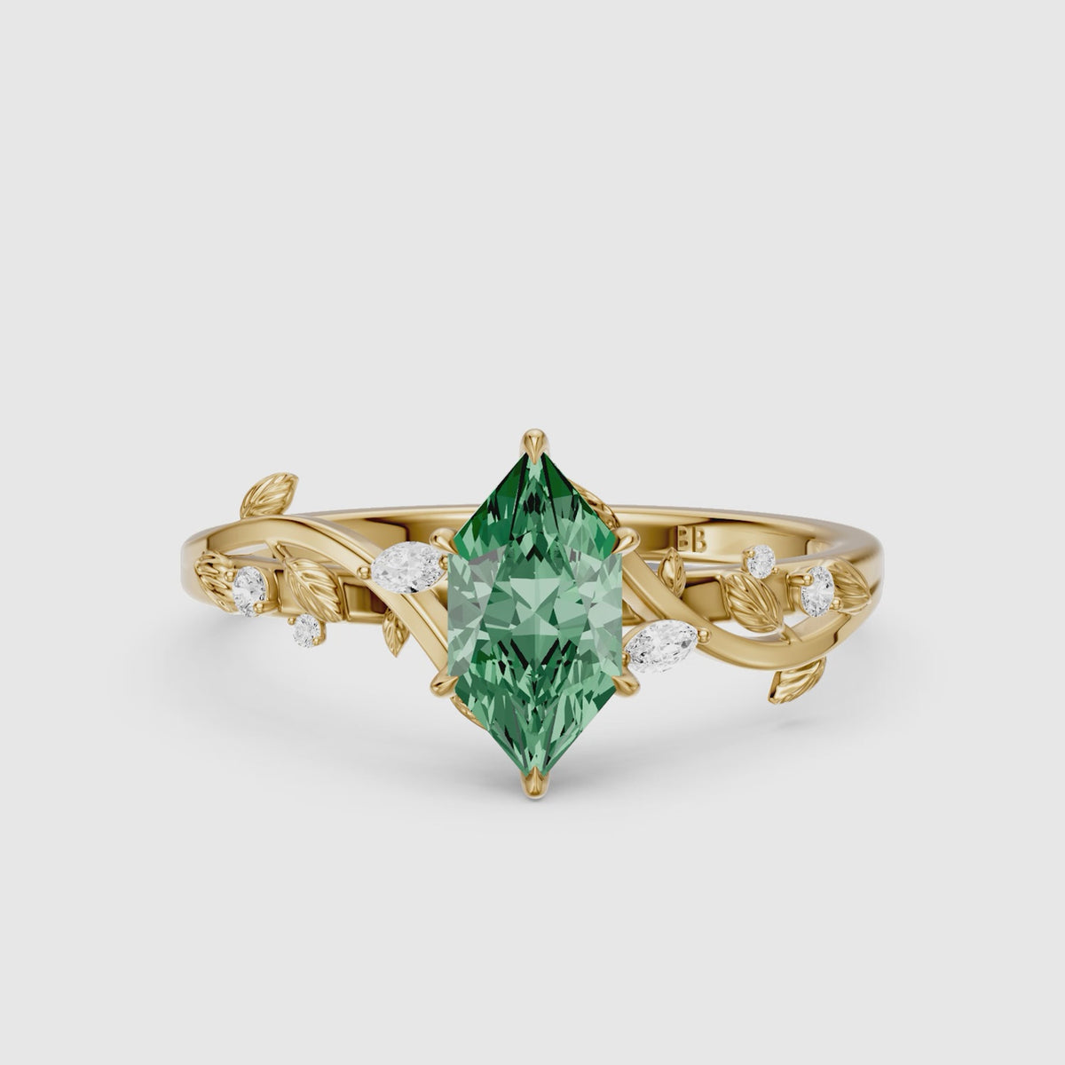 Load video: Finley Dutch Marquise Green Lab Grown Diamond Ring with Leaf Vine Band