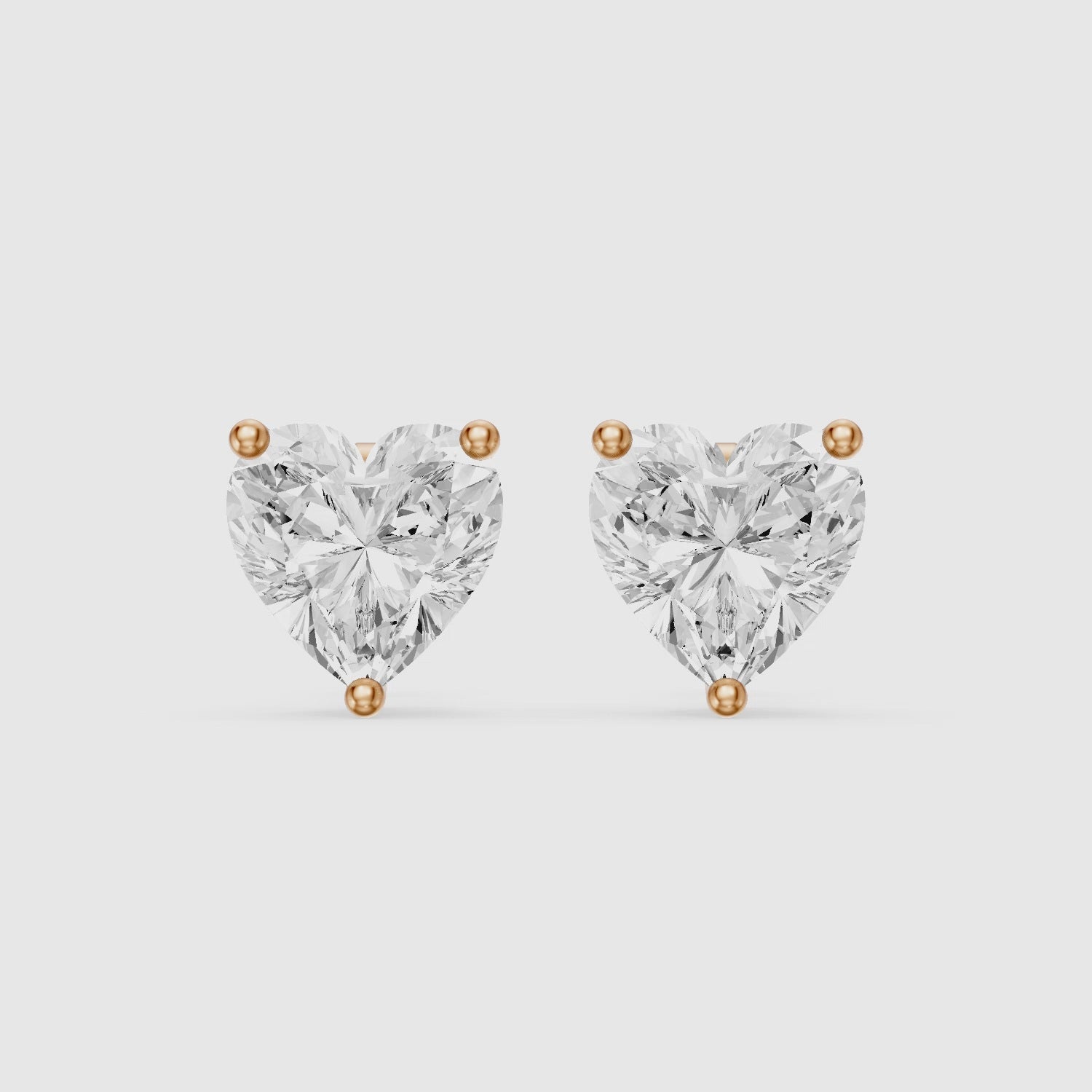 Load video: Cristina Heart Shape Lab Grown Diamond Solitaire Stud Earrings