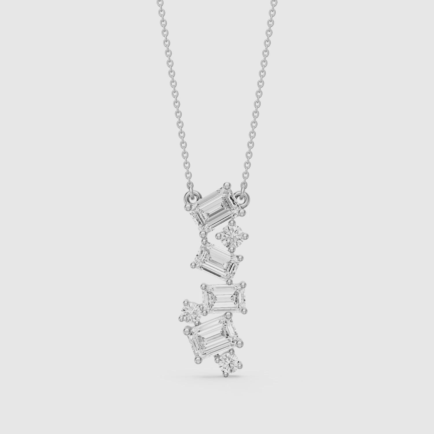Load video: Paula Emerald Cut and Round Lab Grown Diamond Cascade Pendant